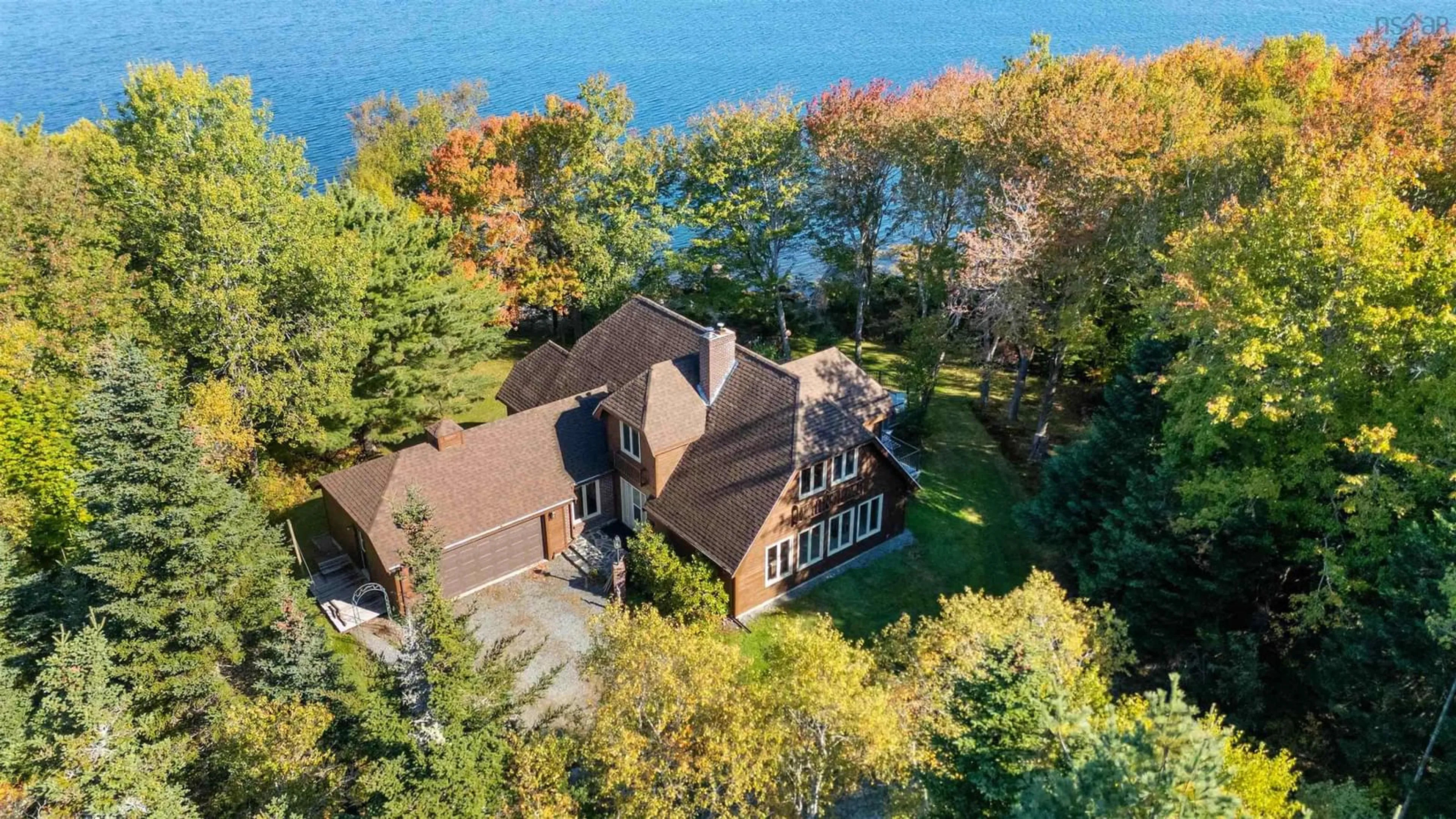 A pic from outside/outdoor area/front of a property/back of a property/a pic from drone, water/lake/river/ocean view for 65 Shore Rd, Mount Pleasant Nova Scotia B0T 1K0