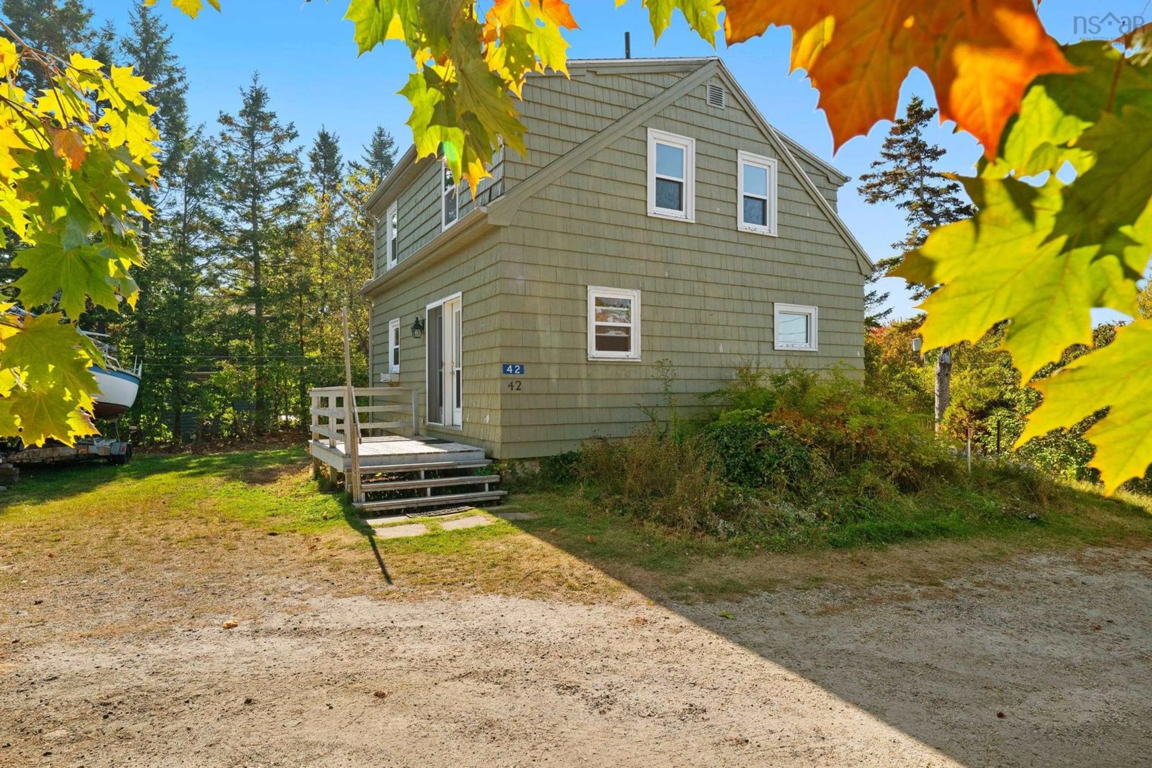 A pic from outside/outdoor area/front of a property/back of a property/a pic from drone, street for 42 Charles Hiltz Rd, Western Shore Nova Scotia B0J 3M0