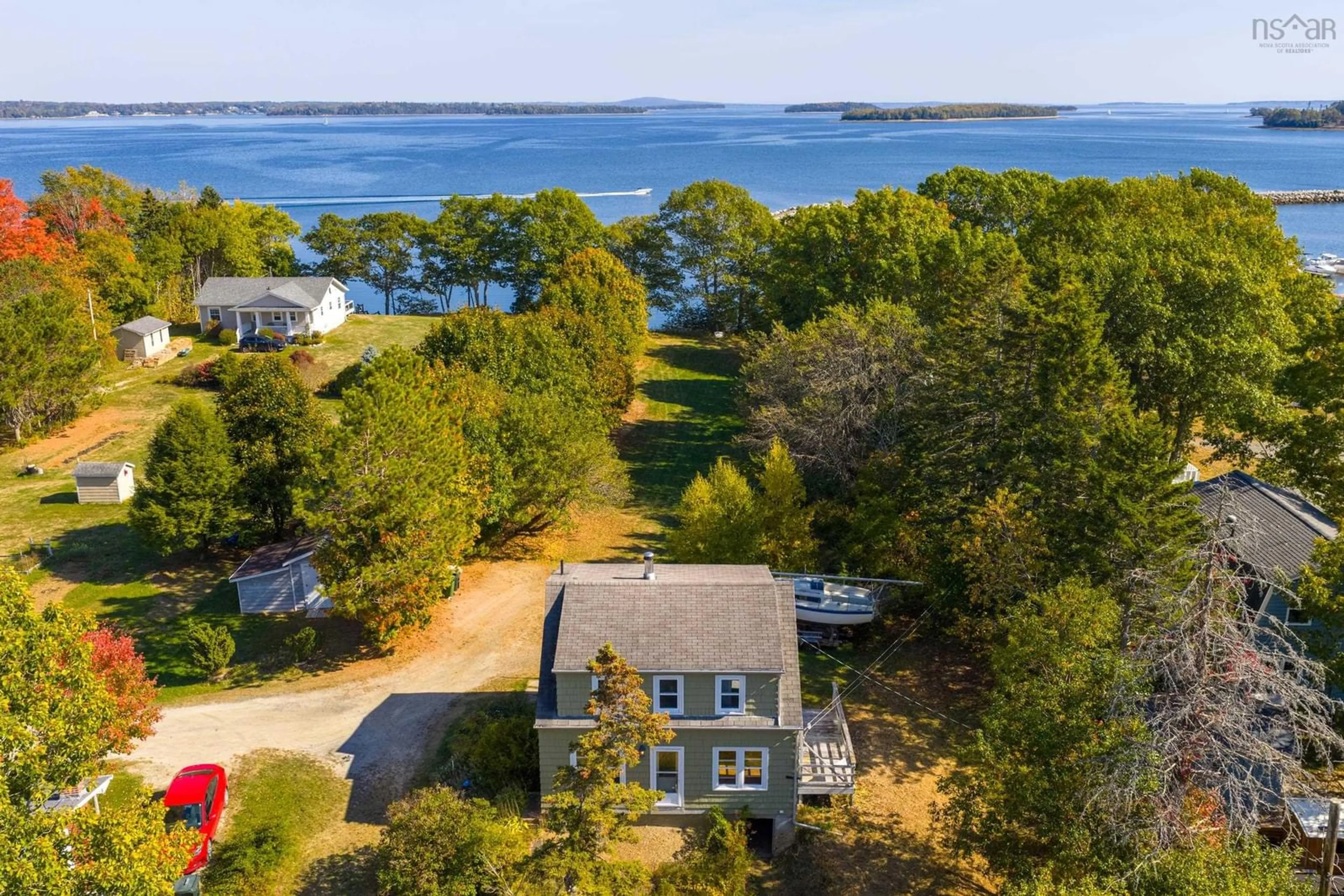 A pic from outside/outdoor area/front of a property/back of a property/a pic from drone, water/lake/river/ocean view for 42 Charles Hiltz Rd, Western Shore Nova Scotia B0J 3M0