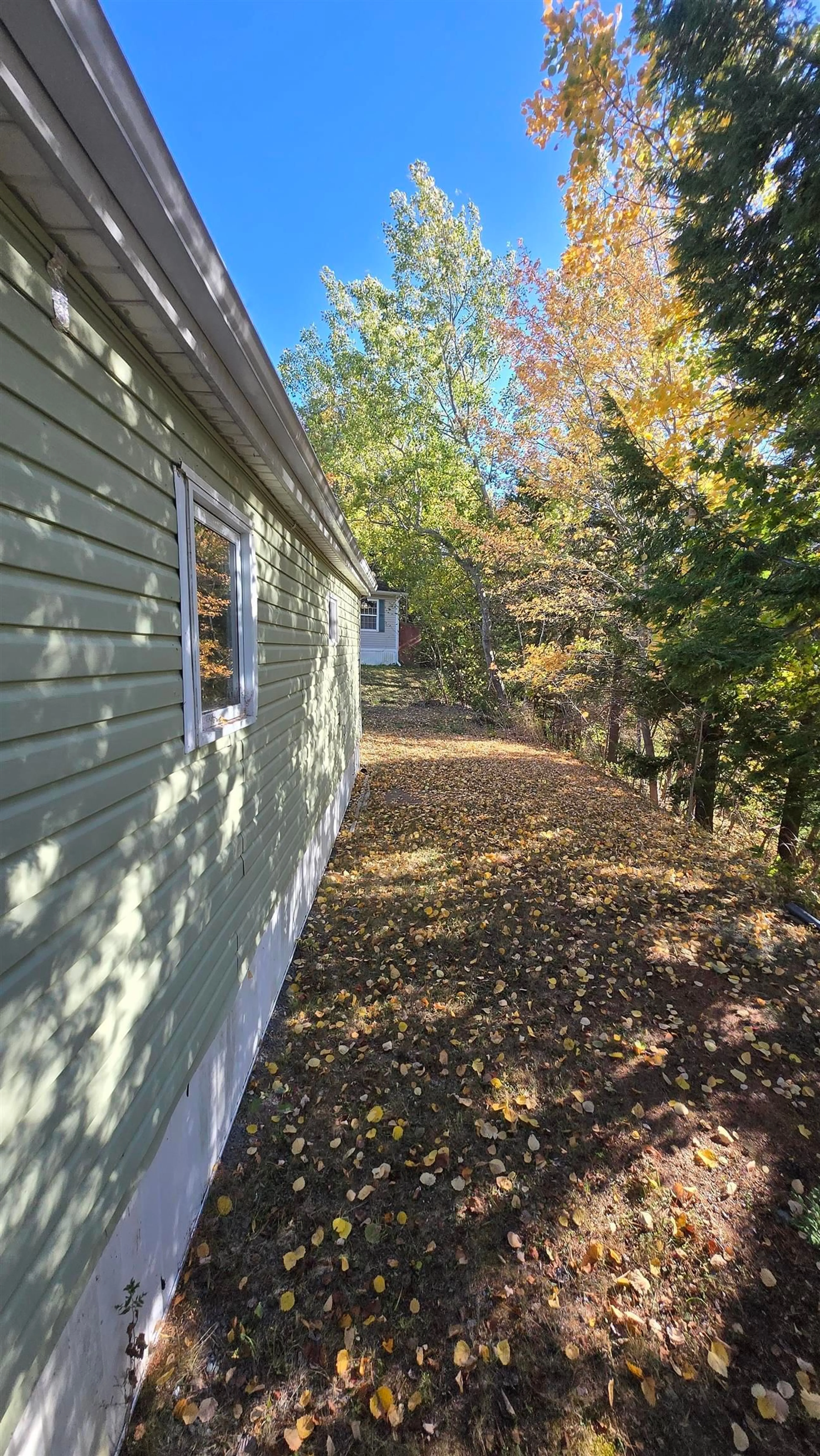 Home with vinyl exterior material, forest/trees view for 91 Cedarwood Cres, New Minas Nova Scotia B4N 5J2
