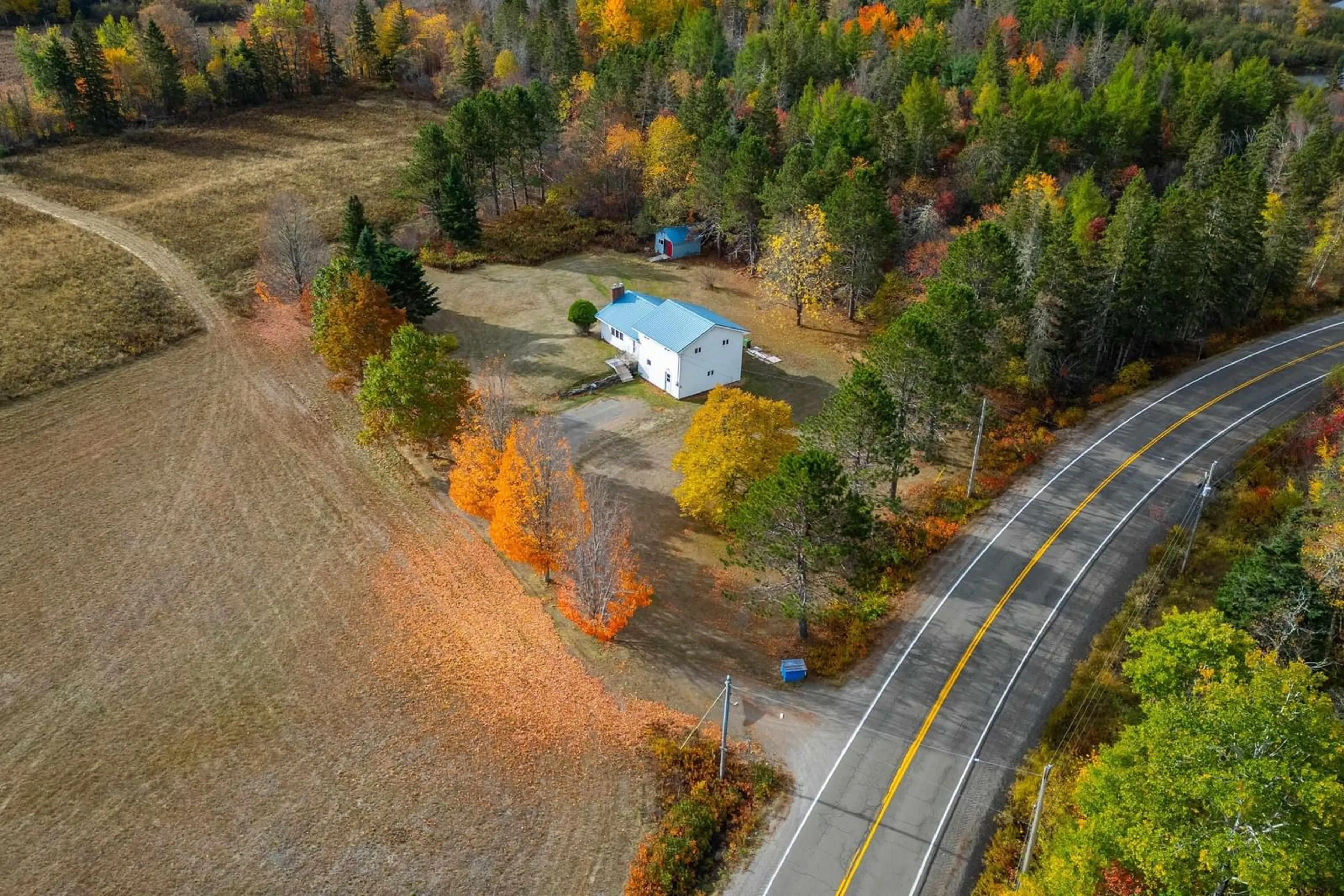 A pic from outside/outdoor area/front of a property/back of a property/a pic from drone, unknown for 9242 Highway 2, Southampton Nova Scotia B0M 1W0