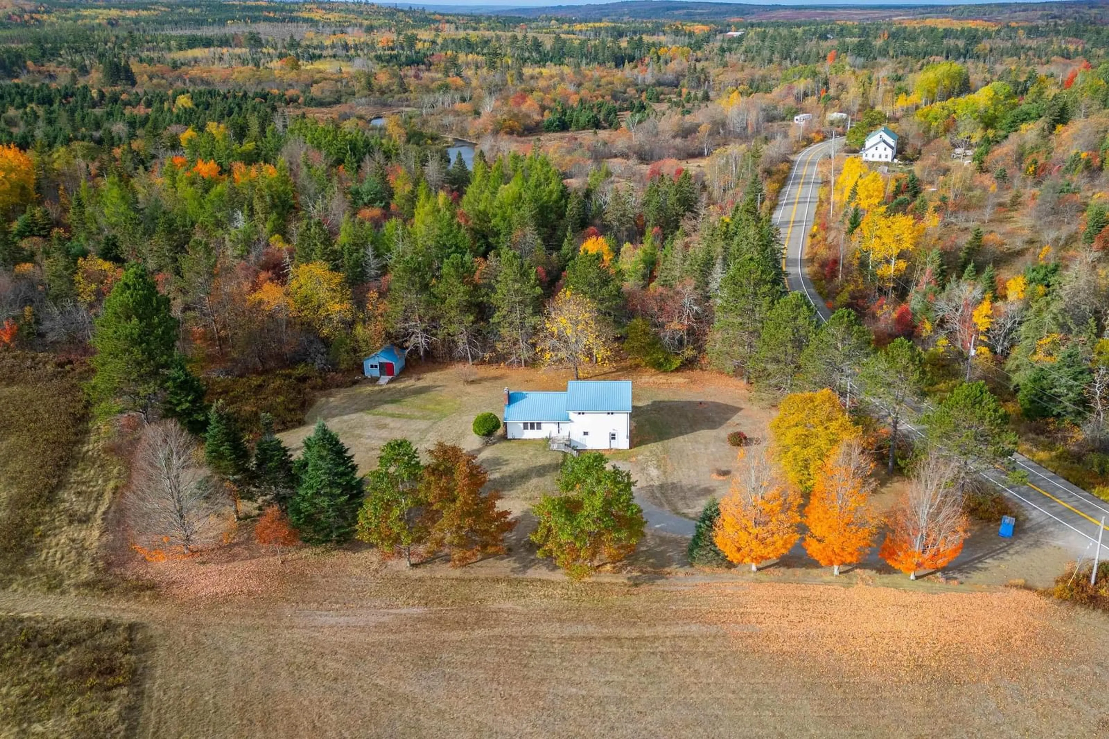 A pic from outside/outdoor area/front of a property/back of a property/a pic from drone, forest/trees view for 9242 Highway 2, Southampton Nova Scotia B0M 1W0