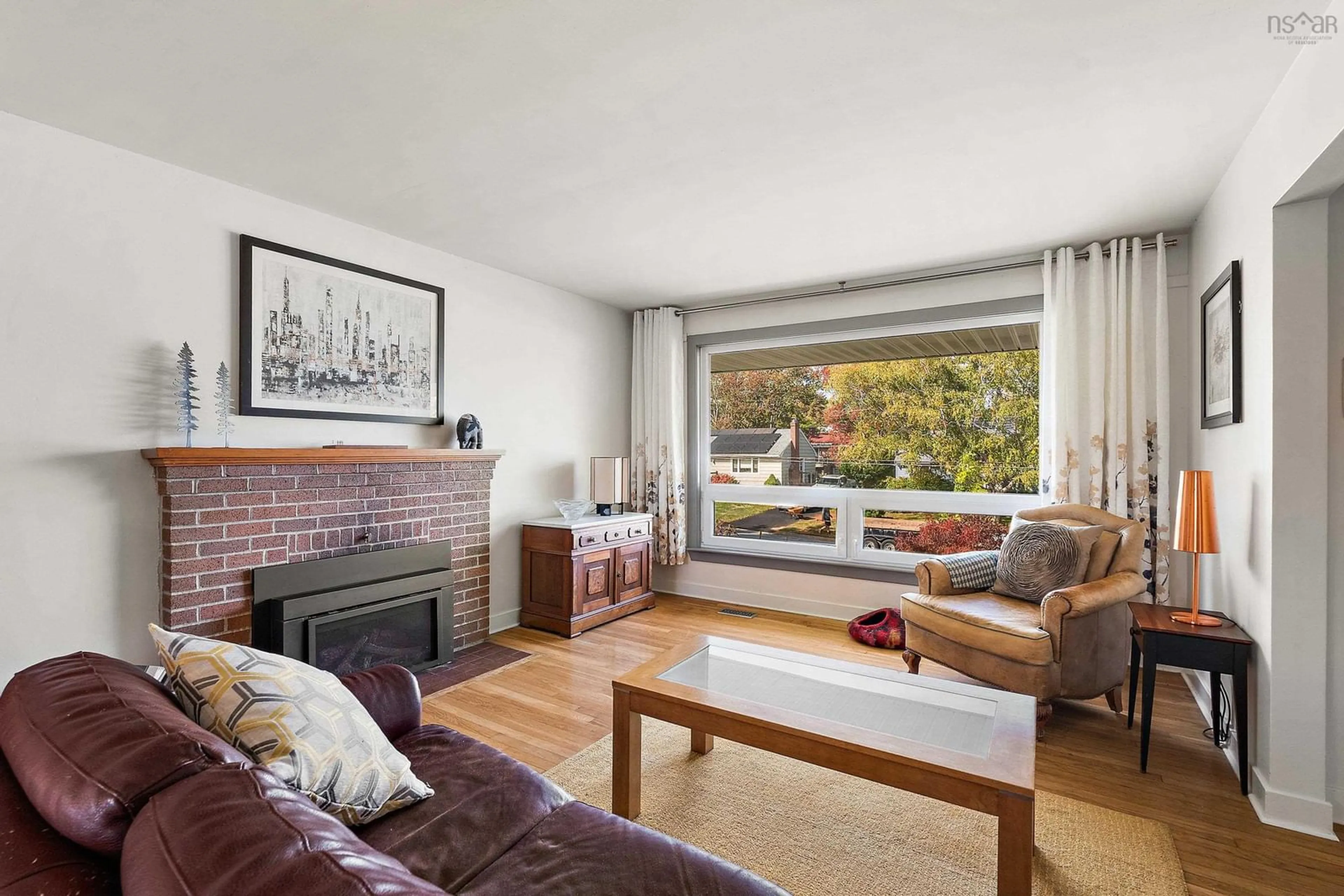 Living room with furniture, wood/laminate floor for 24 Canary Cres, Halifax Nova Scotia B3M 1R1