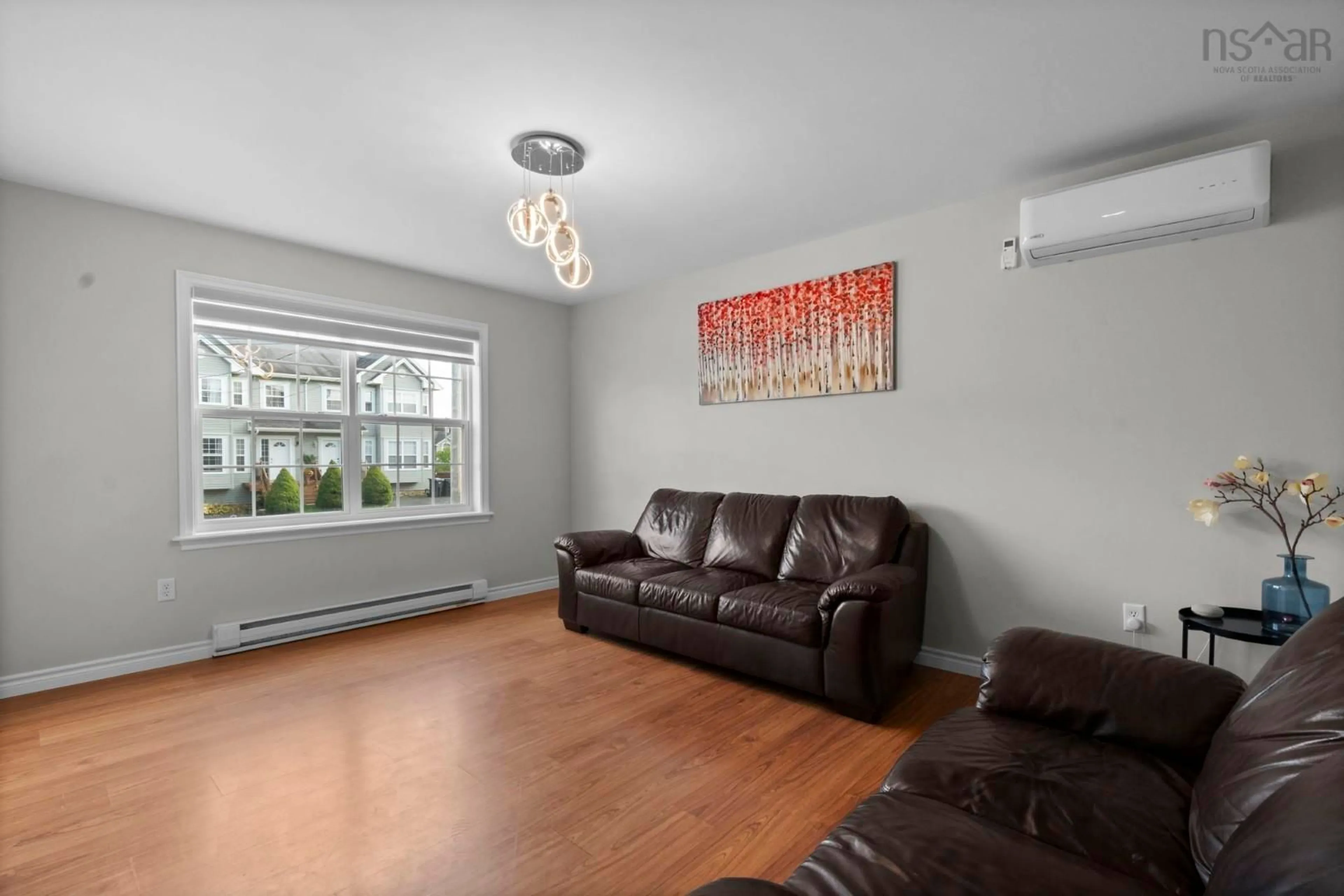 Living room with furniture, wood/laminate floor for 139 North Green Rd, Lakeside Nova Scotia B3T 2L6