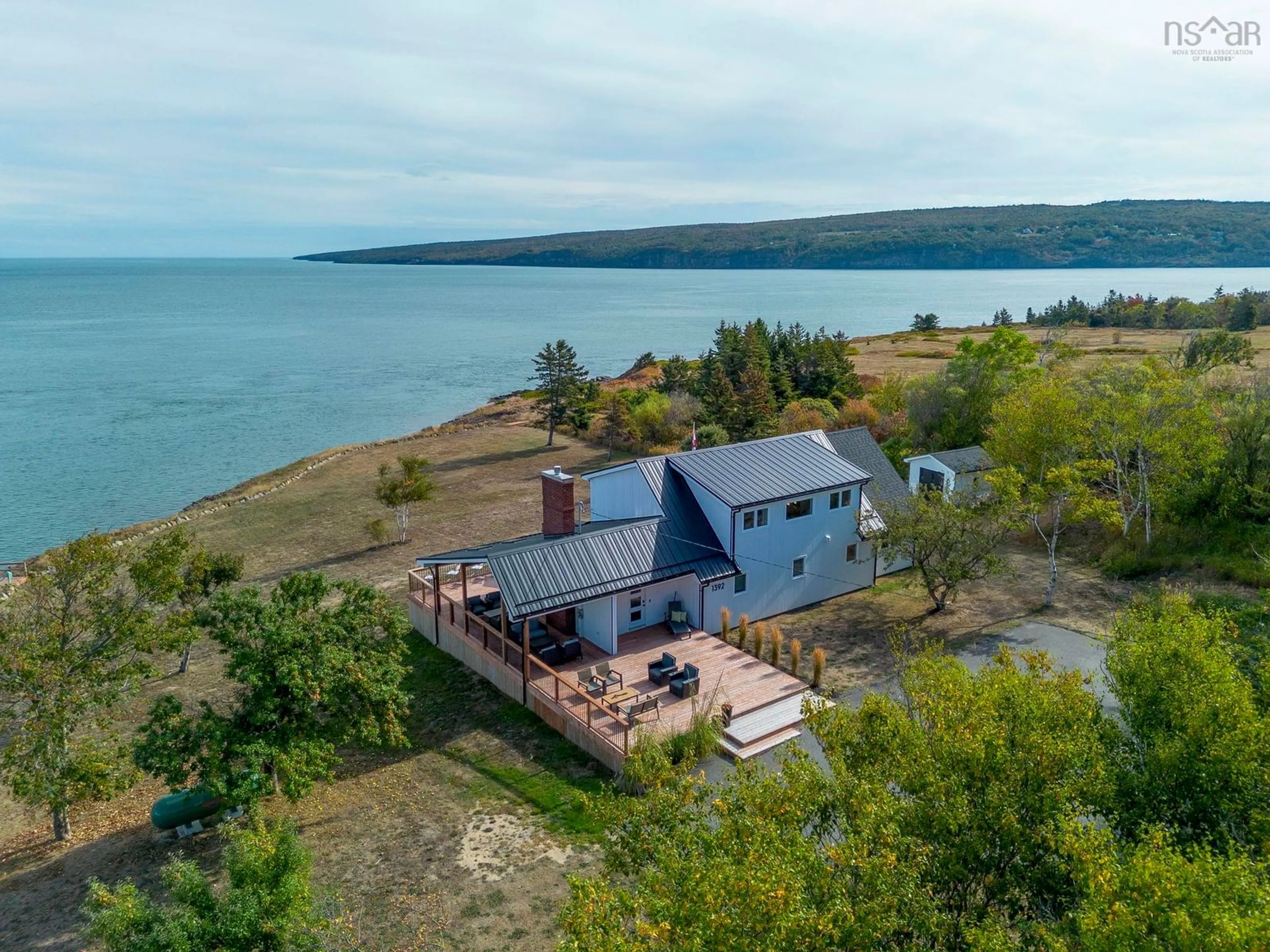 A pic from outside/outdoor area/front of a property/back of a property/a pic from drone, water/lake/river/ocean view for 1392 Lighthouse Rd, Bay View Nova Scotia B0V 1A0