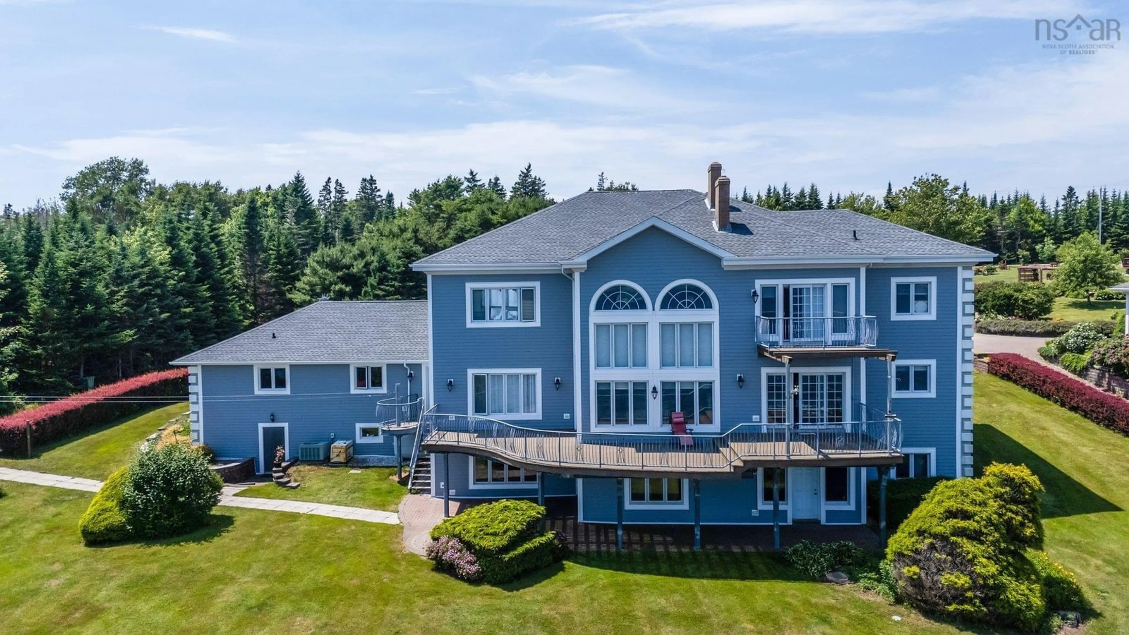 A pic from outside/outdoor area/front of a property/back of a property/a pic from drone, water/lake/river/ocean view for 38 Lennox Rd, Black Point Nova Scotia B0J 1T0