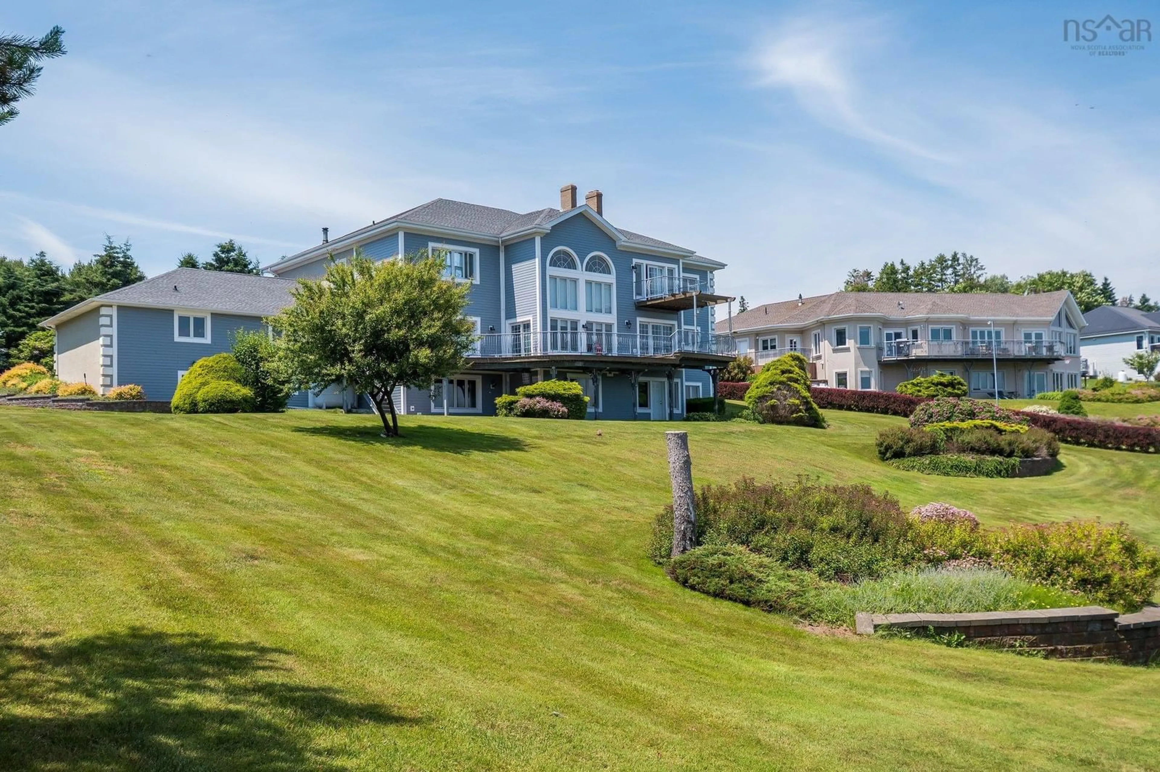 A pic from outside/outdoor area/front of a property/back of a property/a pic from drone, water/lake/river/ocean view for 38 Lennox Rd, Black Point Nova Scotia B0J 1T0