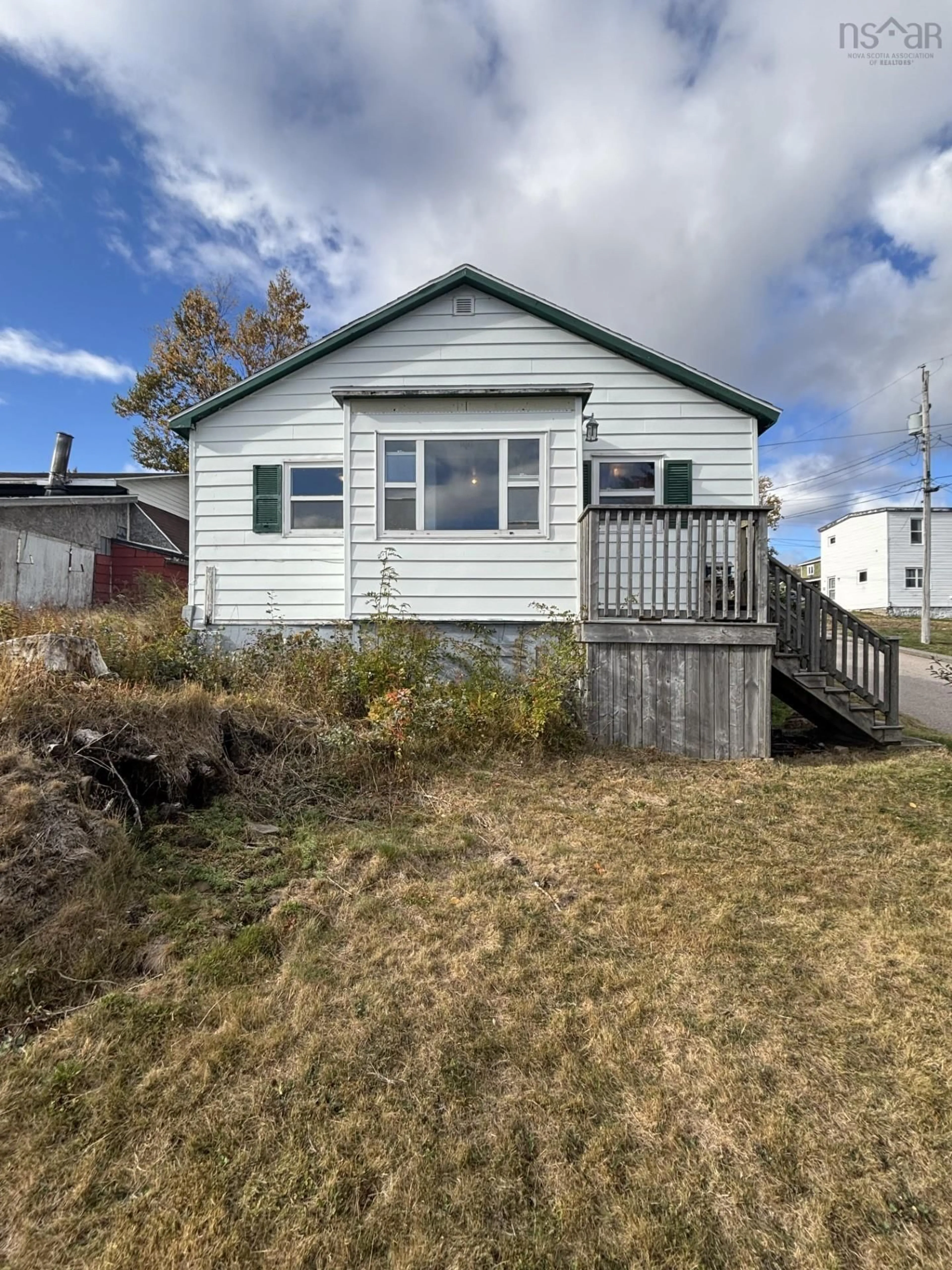 Home with vinyl exterior material, street for 8 East St, North Sydney Nova Scotia B2A 2Z8