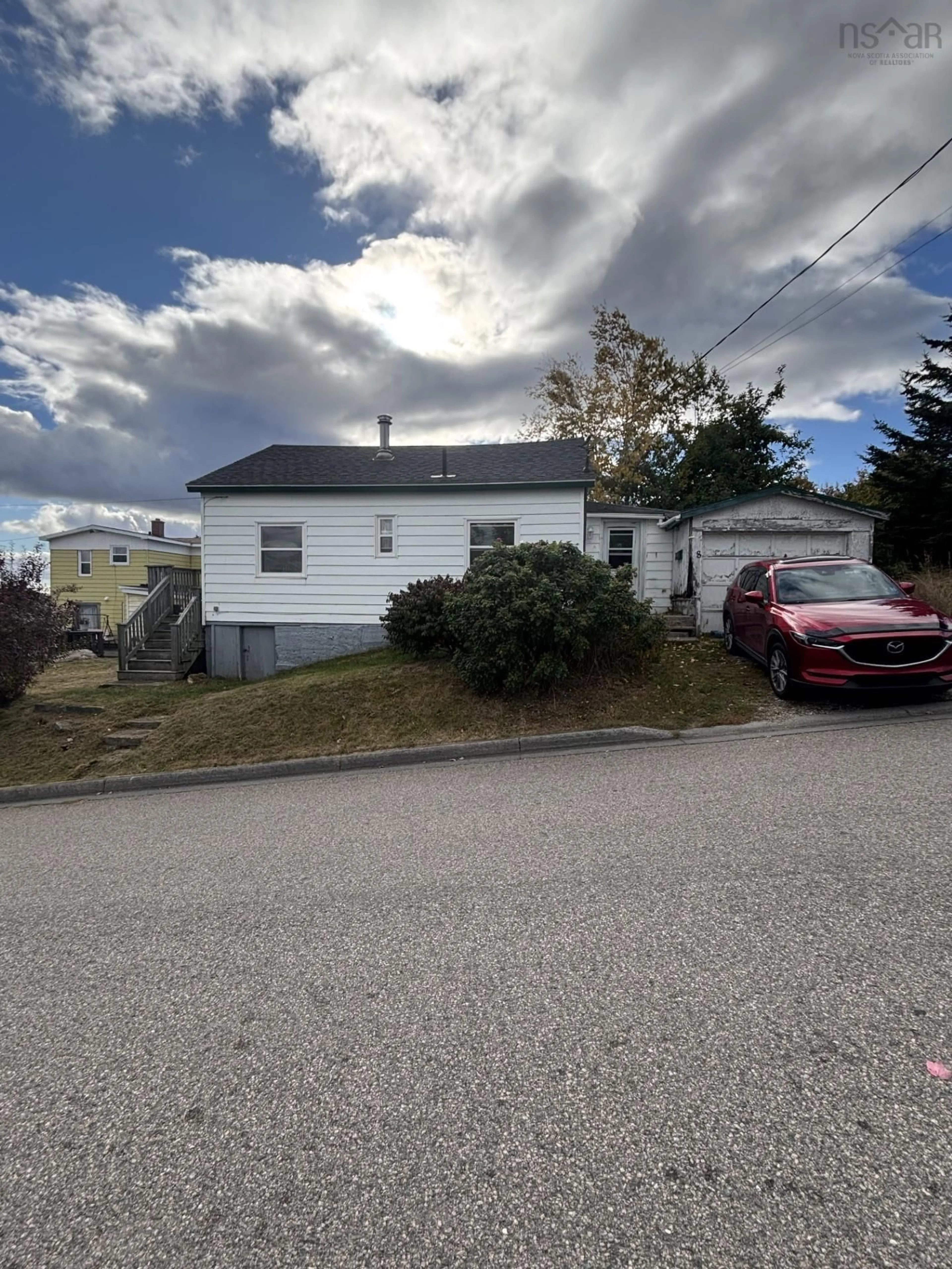 A pic from outside/outdoor area/front of a property/back of a property/a pic from drone, street for 8 East St, North Sydney Nova Scotia B2A 2Z8