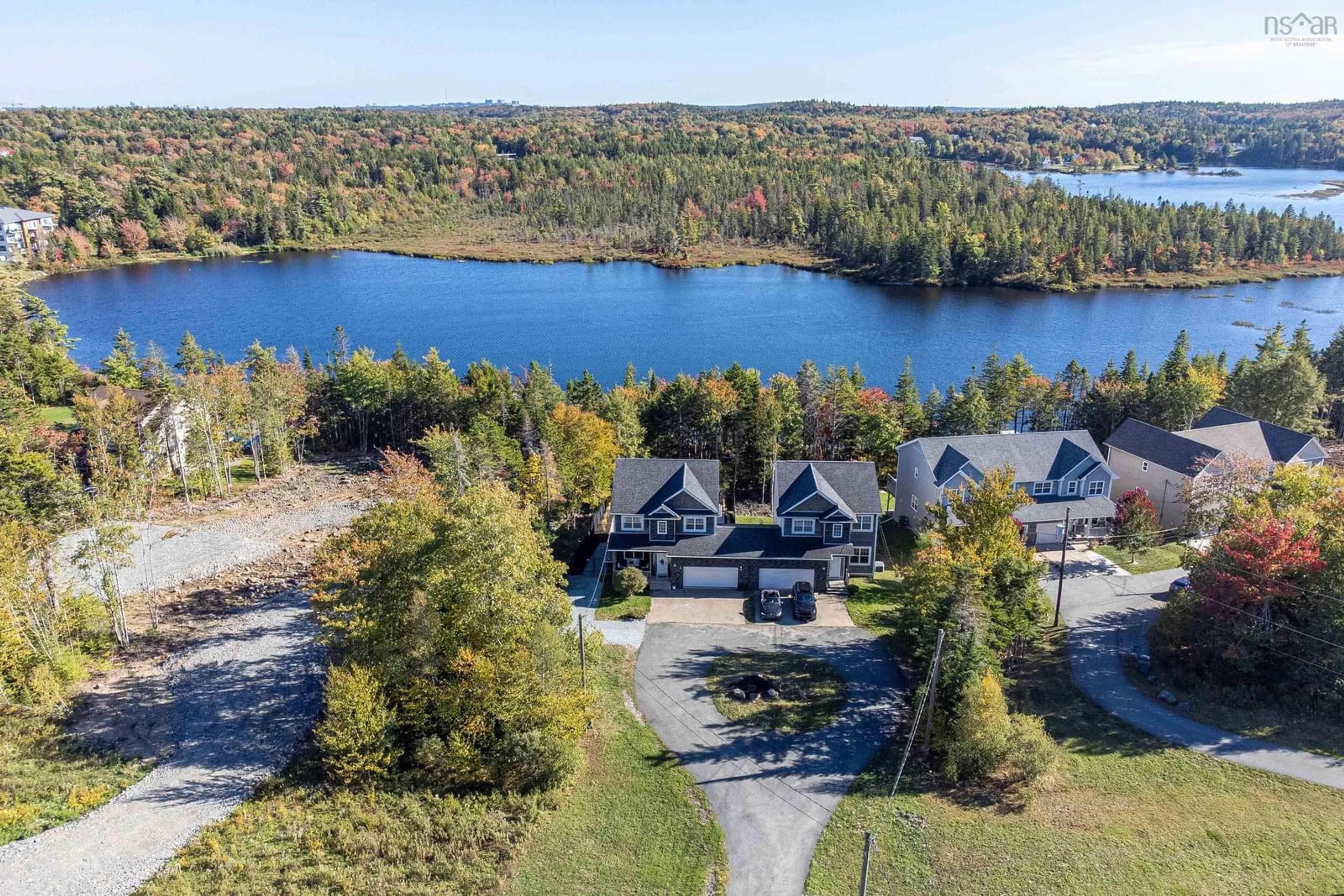 A pic from outside/outdoor area/front of a property/back of a property/a pic from drone, water/lake/river/ocean view for 212 Voyageur Way, Hammonds Plains Nova Scotia B4B 2C1