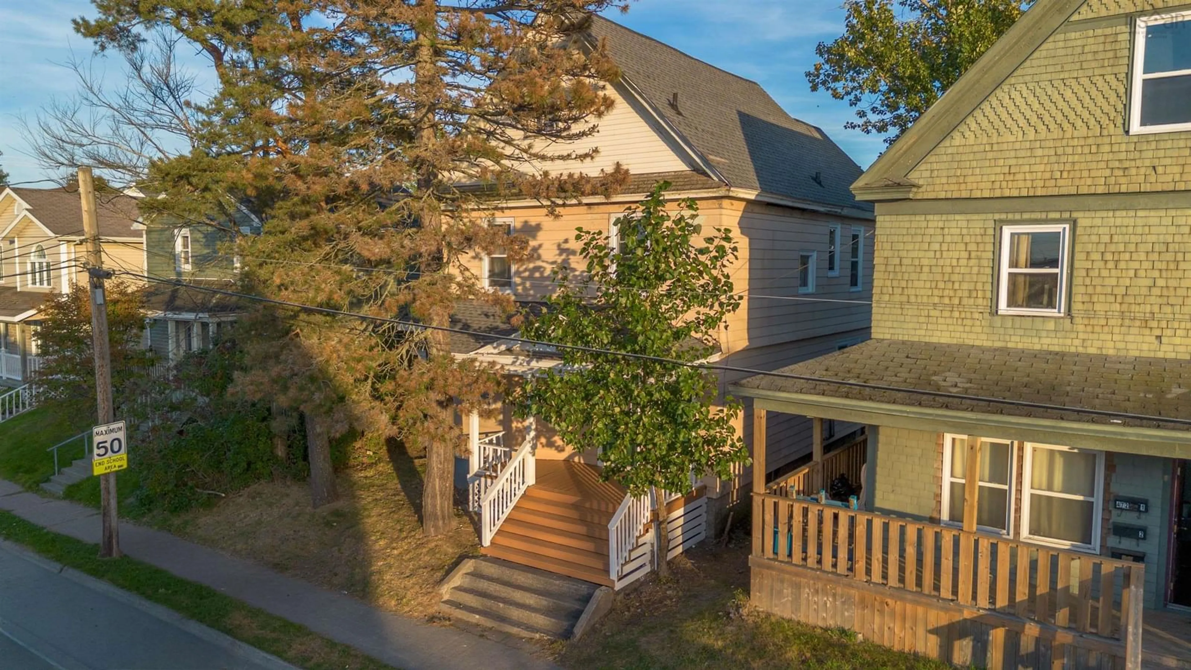 A pic from outside/outdoor area/front of a property/back of a property/a pic from drone, street for 476 Townsend St, Sydney Nova Scotia B1P 5G6