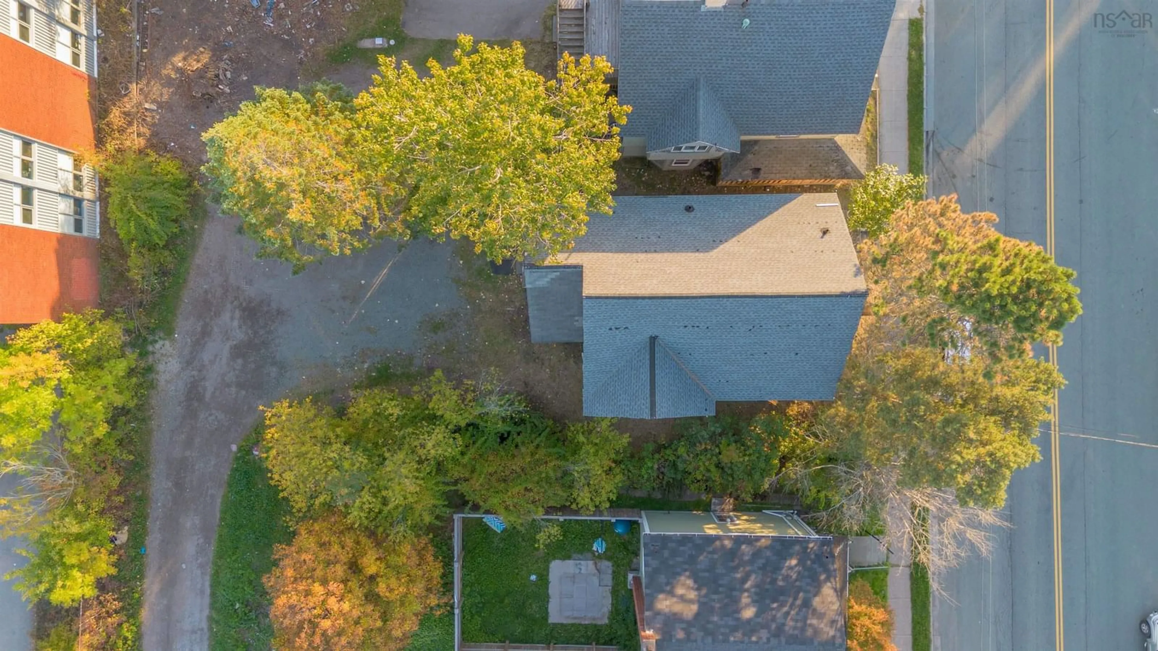 A pic from outside/outdoor area/front of a property/back of a property/a pic from drone, unknown for 476 Townsend St, Sydney Nova Scotia B1P 5G6
