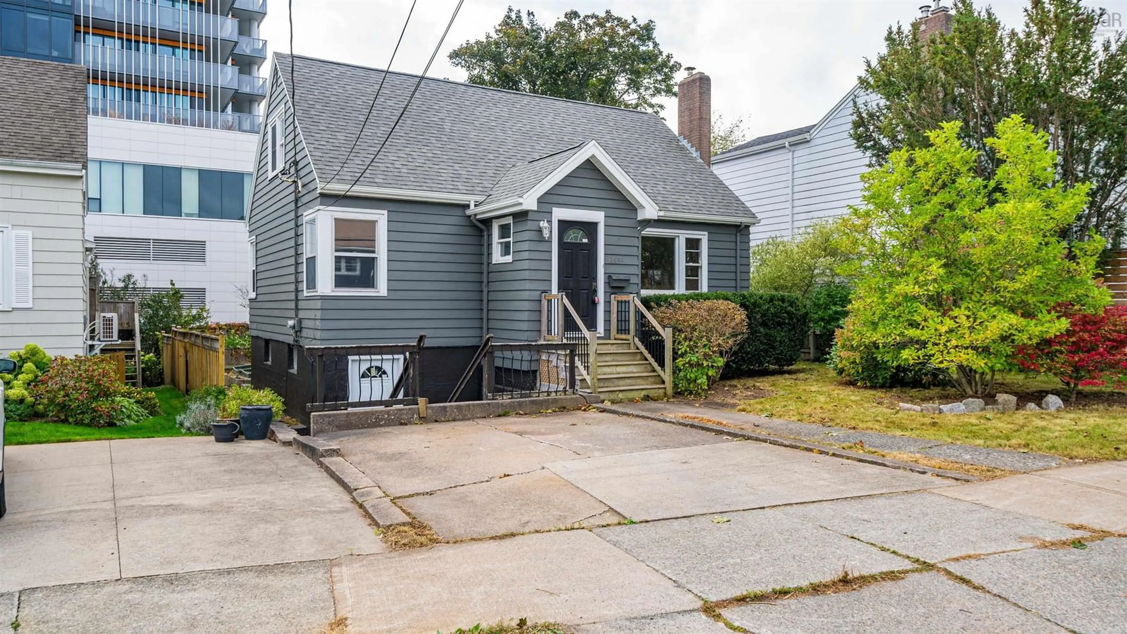 Home with vinyl exterior material, street for 7038 Pearson Dr, Halifax Nova Scotia B3L 2K8