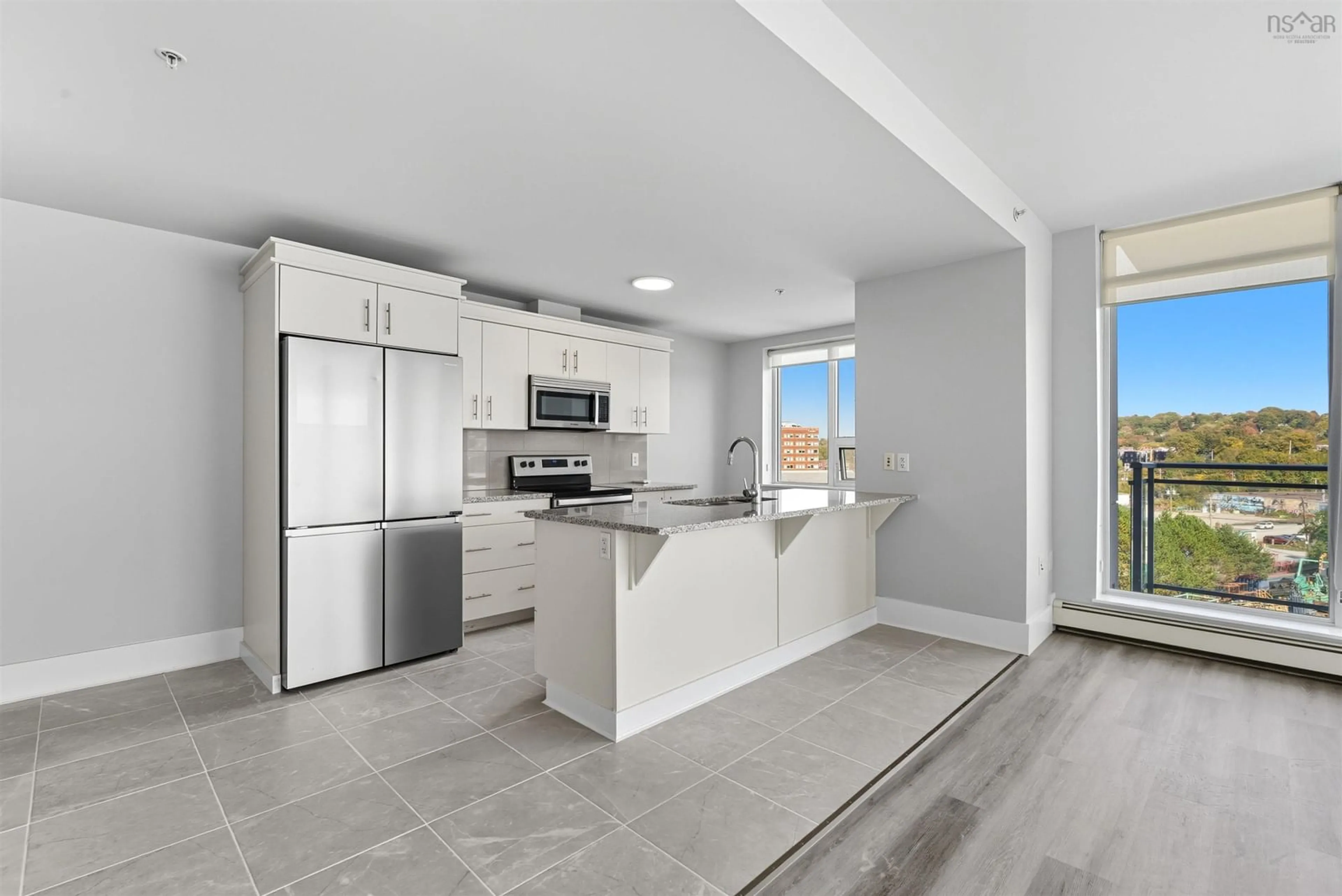 Open concept kitchen, ceramic/tile floor for 15 Kings Wharf Place #502, Dartmouth Nova Scotia B2Y 0C2