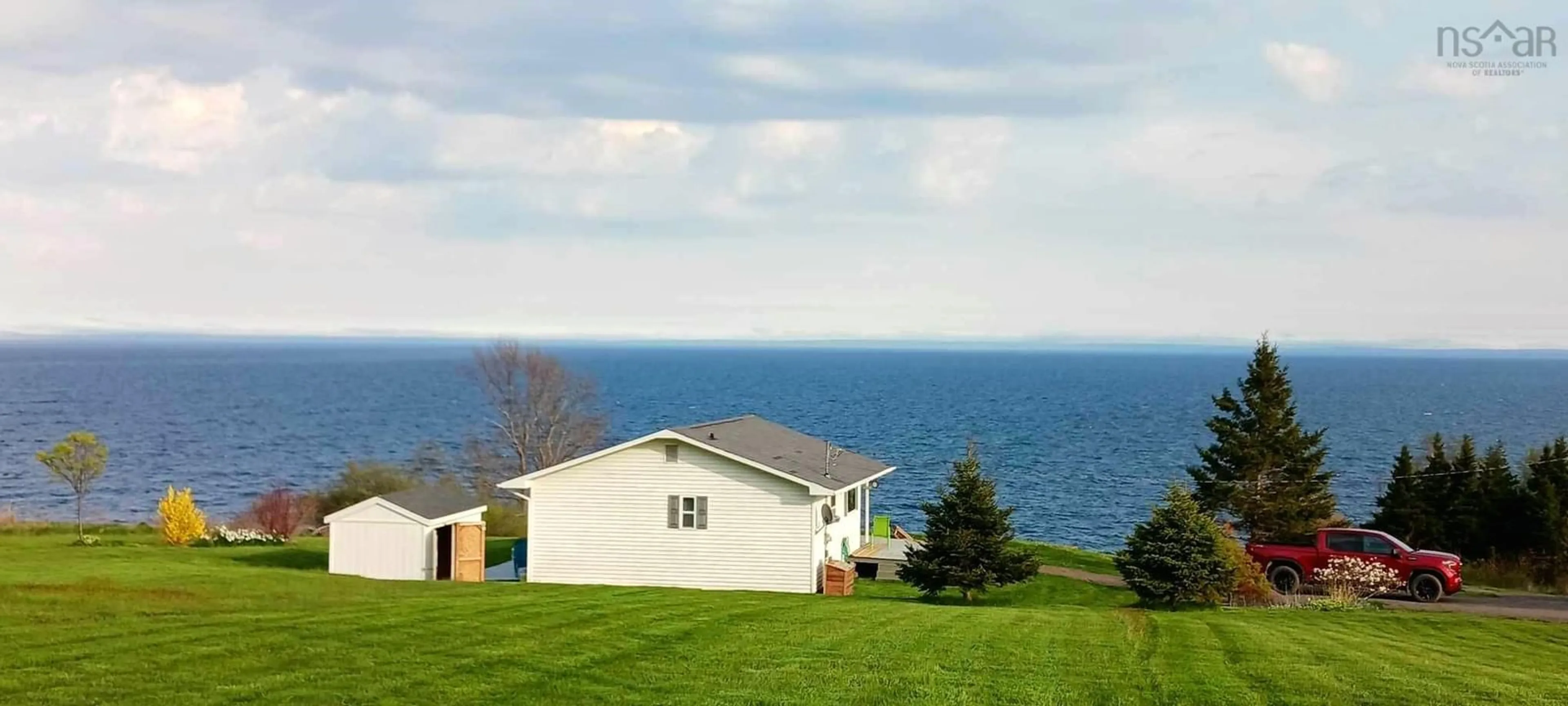 A pic from outside/outdoor area/front of a property/back of a property/a pic from drone, water/lake/river/ocean view for 23 Shee Nan Dool Rd, Cape George Nova Scotia B2G 2L2