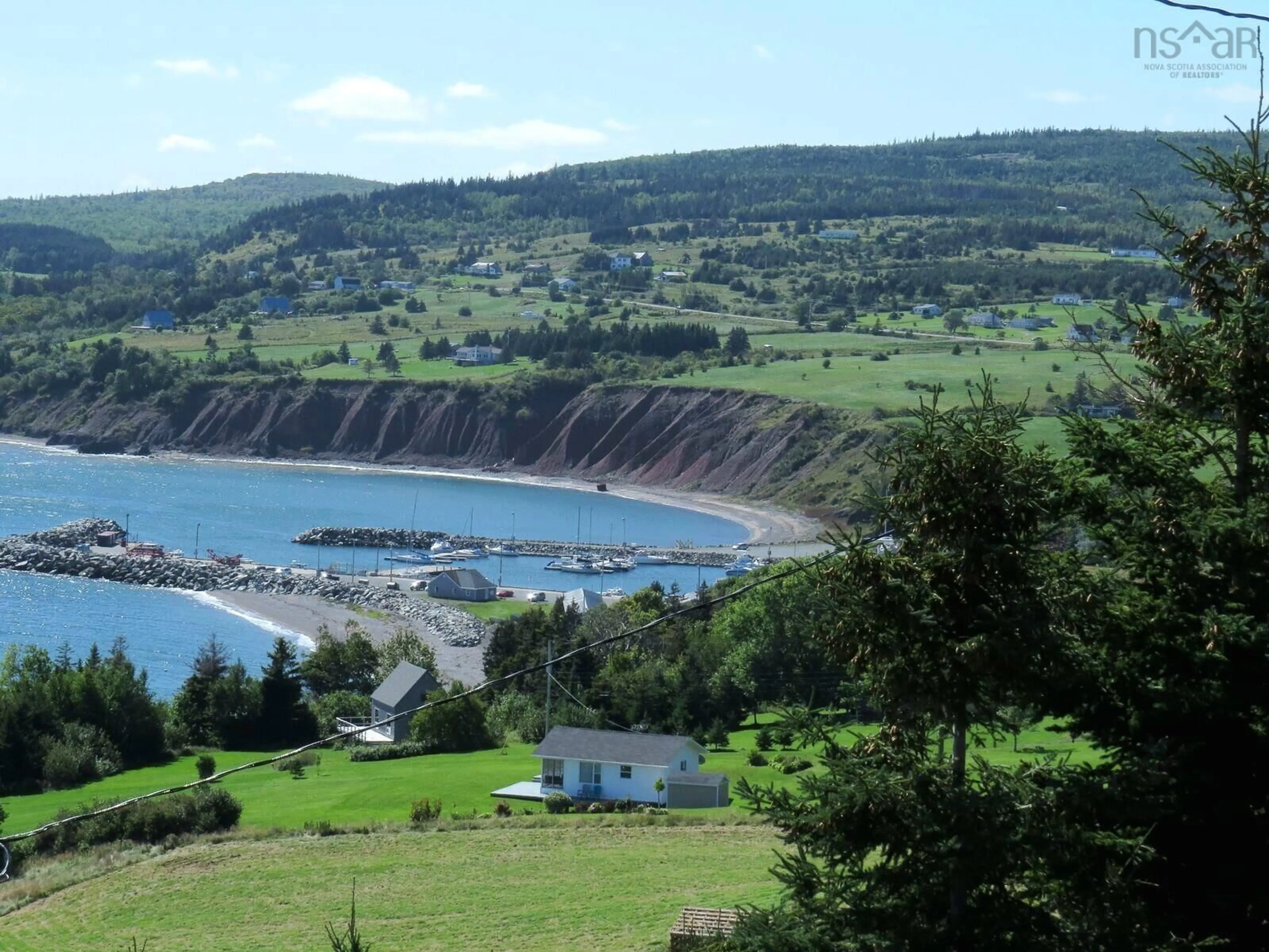 A pic from outside/outdoor area/front of a property/back of a property/a pic from drone, water/lake/river/ocean view for 23 Shee Nan Dool Rd, Cape George Nova Scotia B2G 2L2