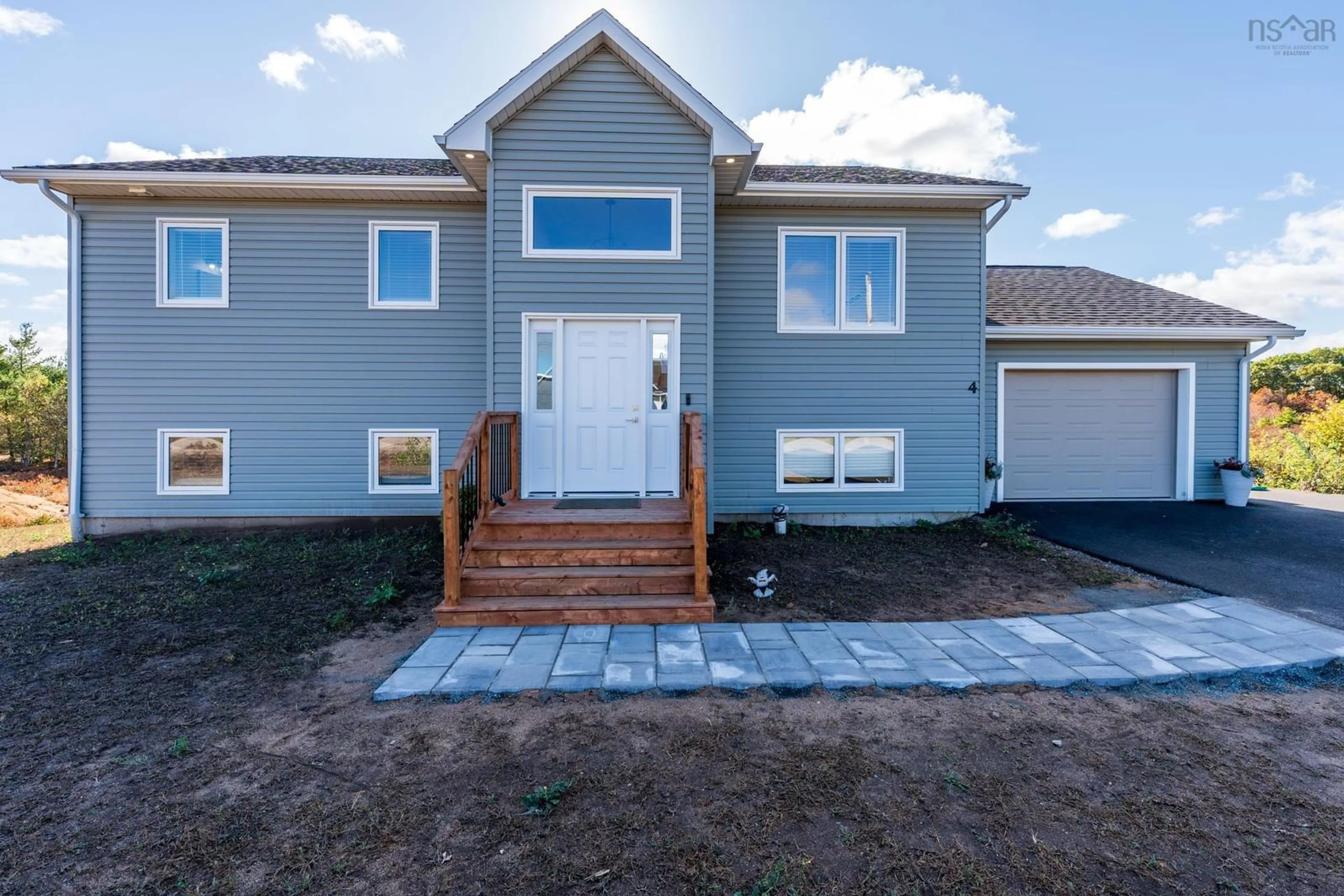 Home with vinyl exterior material, street for 4 Acorn Lane, Kingston Nova Scotia B0P 1R0