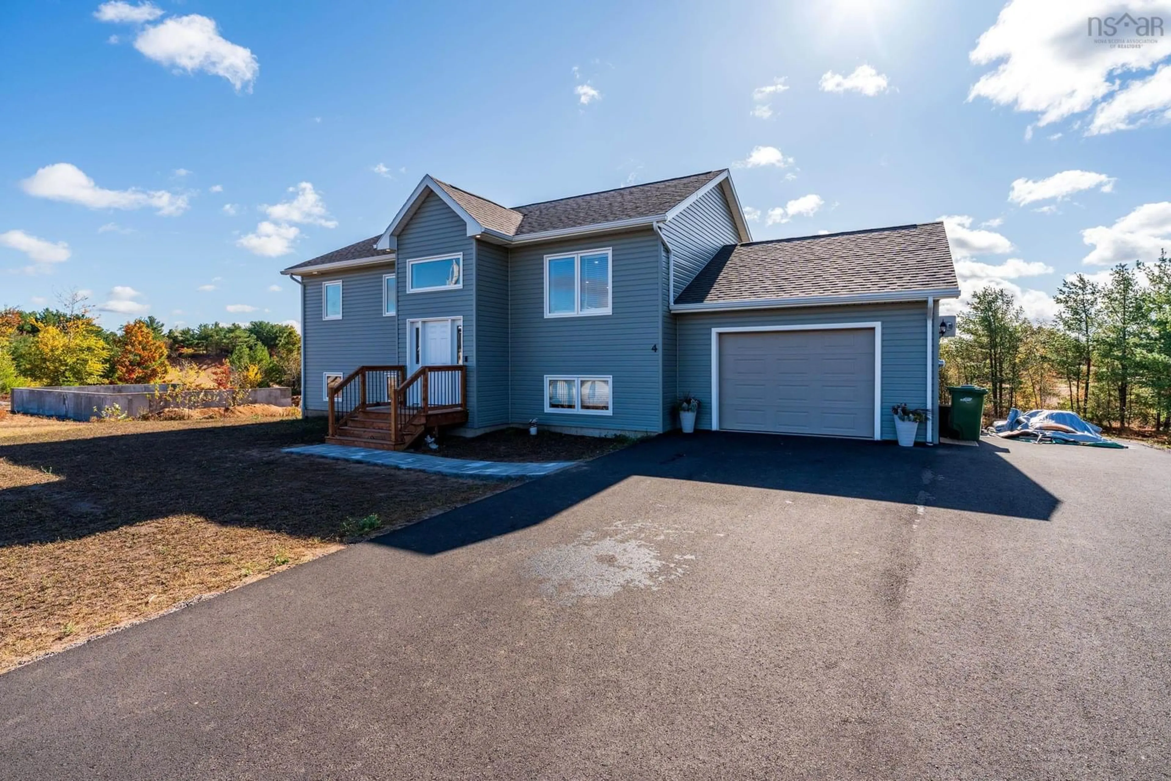 Home with vinyl exterior material, street for 4 Acorn Lane, Kingston Nova Scotia B0P 1R0