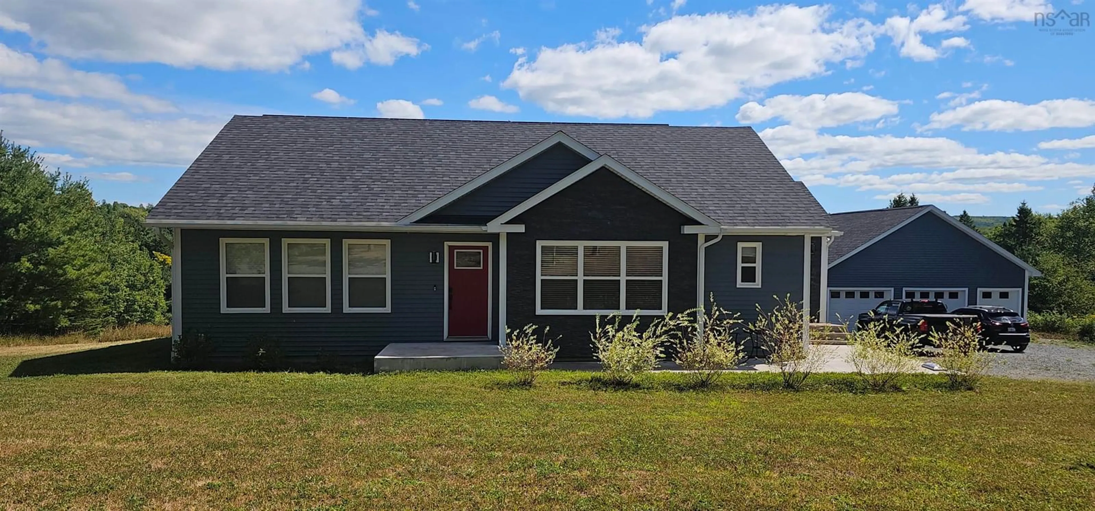 Home with vinyl exterior material, street for 25 Lakewood Dr, Brooklyn Nova Scotia B0N 2A0