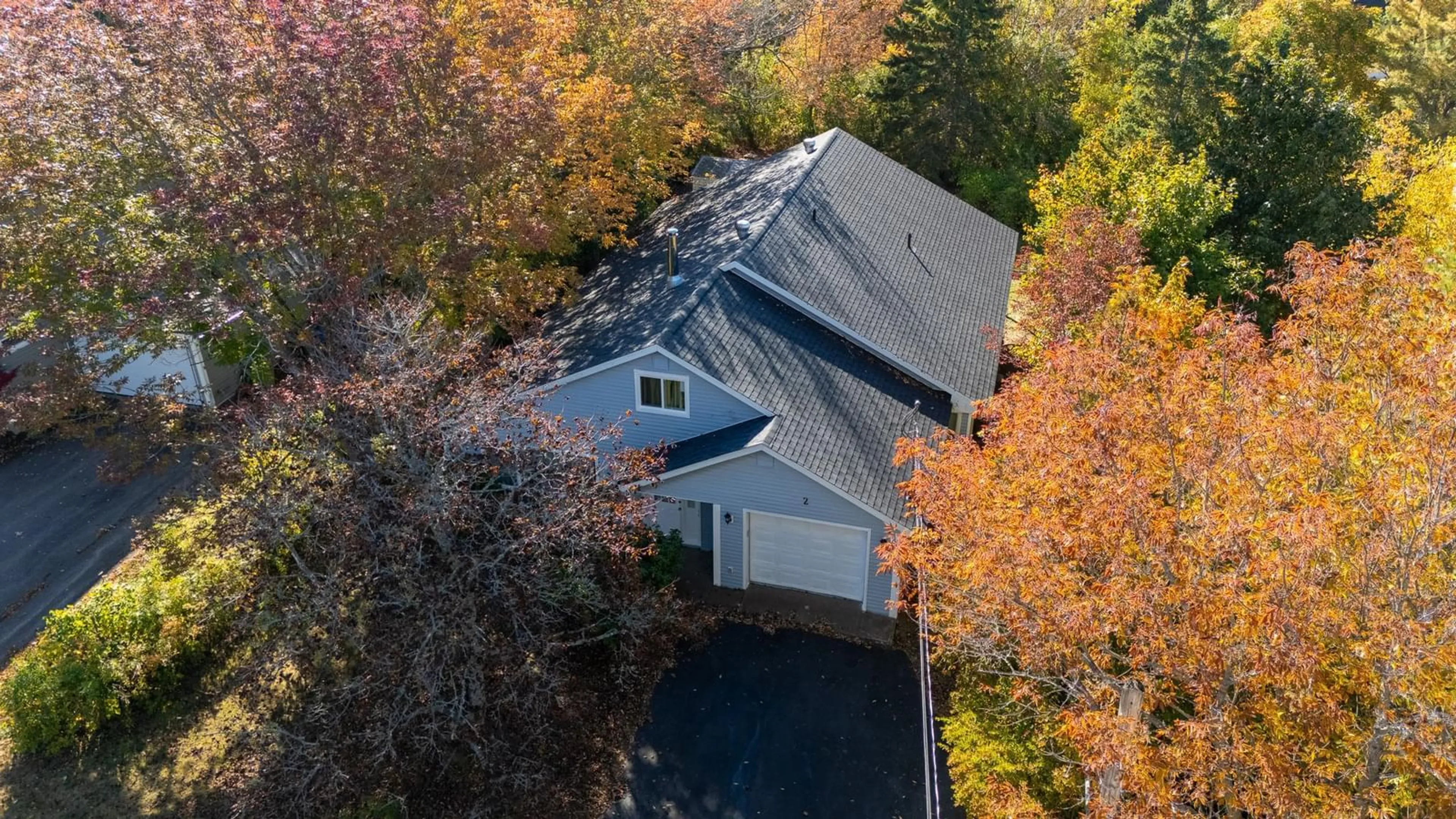 A pic from outside/outdoor area/front of a property/back of a property/a pic from drone, unknown for 2 Riverview Ave, Wolfville Nova Scotia B4P 2B5