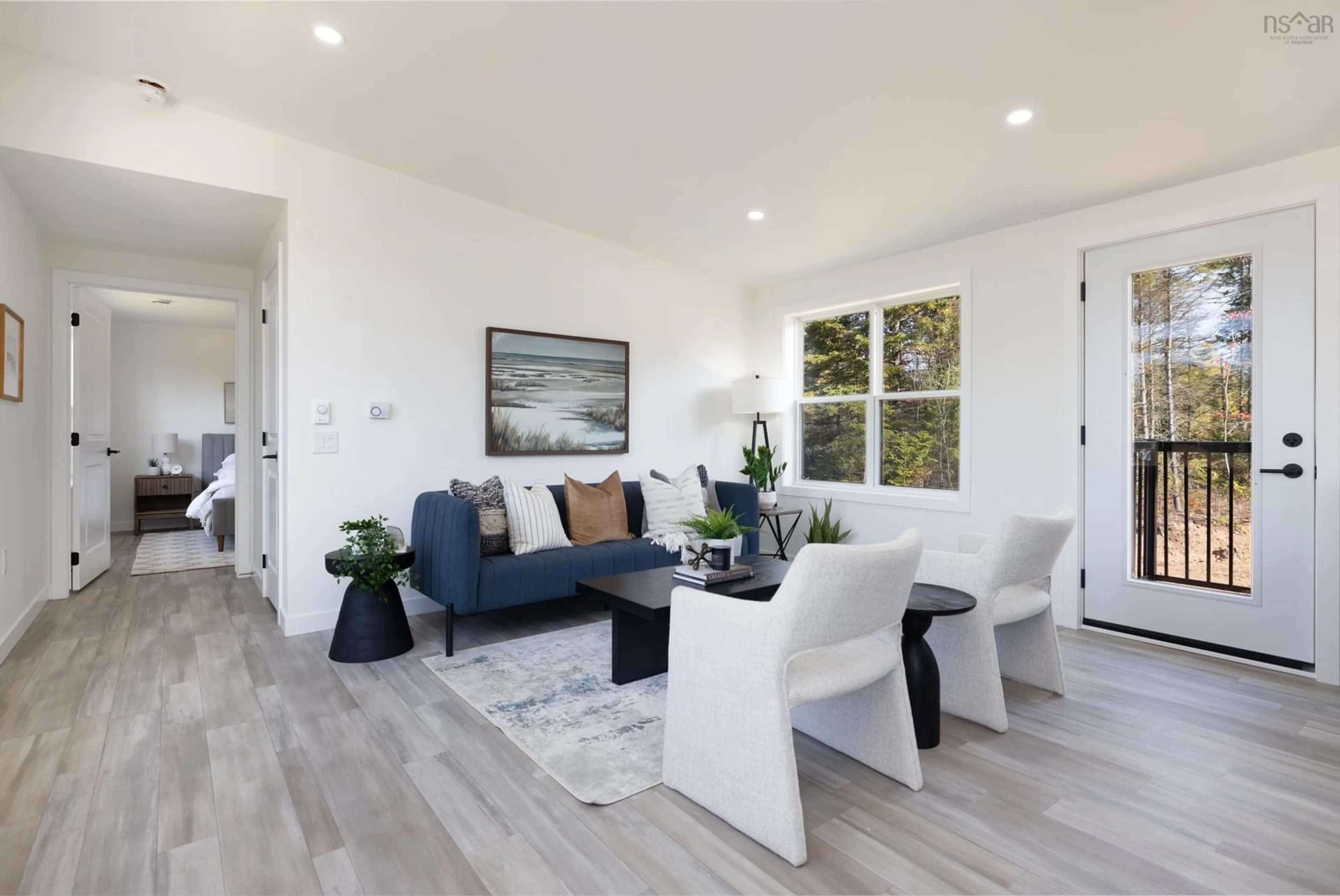 Living room with furniture, wood/laminate floor for 3 Pebble Lane, West St. Andrews Nova Scotia B0N 2J0