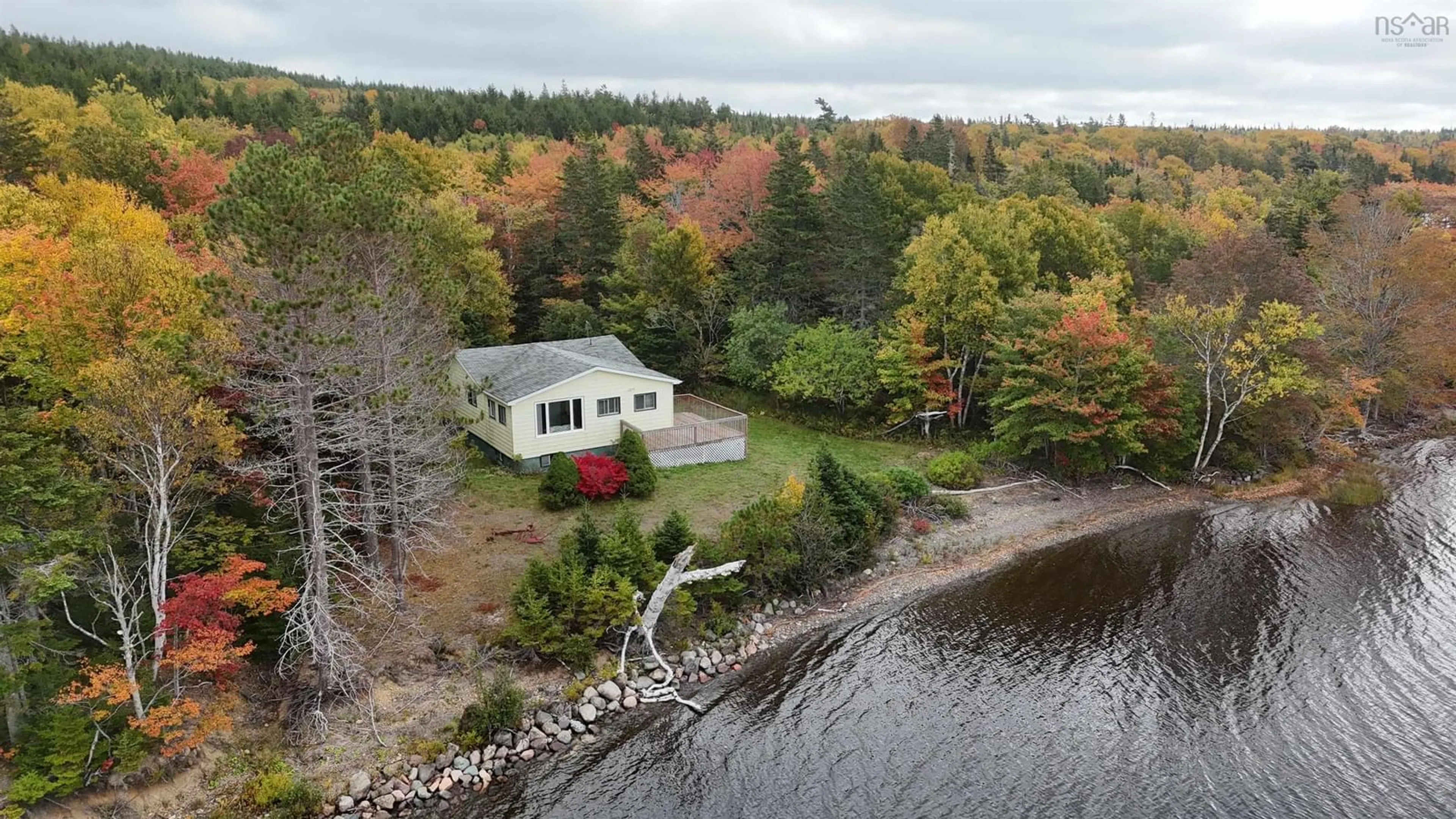 A pic from outside/outdoor area/front of a property/back of a property/a pic from drone, water/lake/river/ocean view for 2788 Grand Mira South Rd, Grand Mira South Nova Scotia B1K 1K5