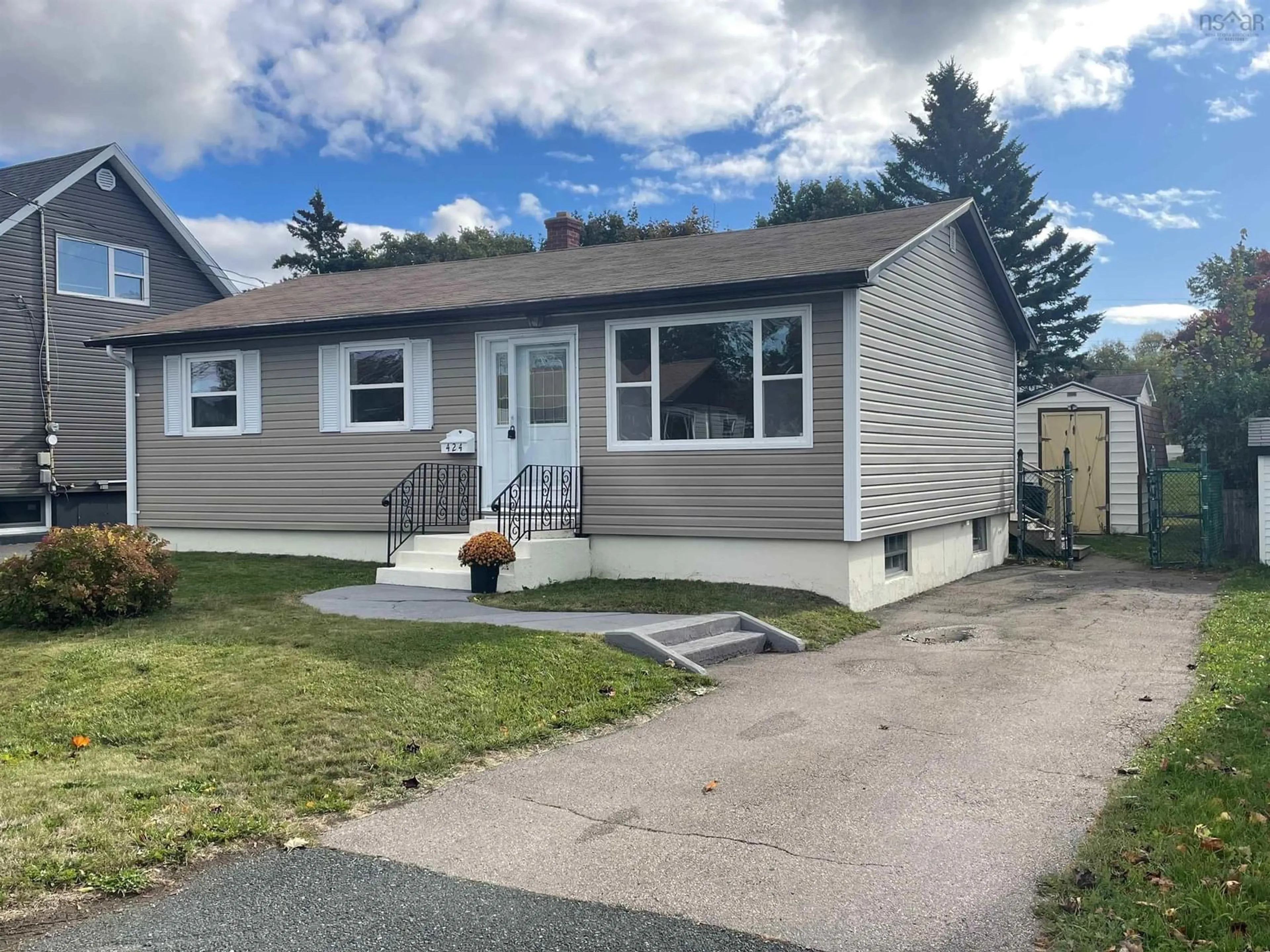 Home with vinyl exterior material, street for 424 Birch Hill Drive, Sydney Nova Scotia B1P 3V9