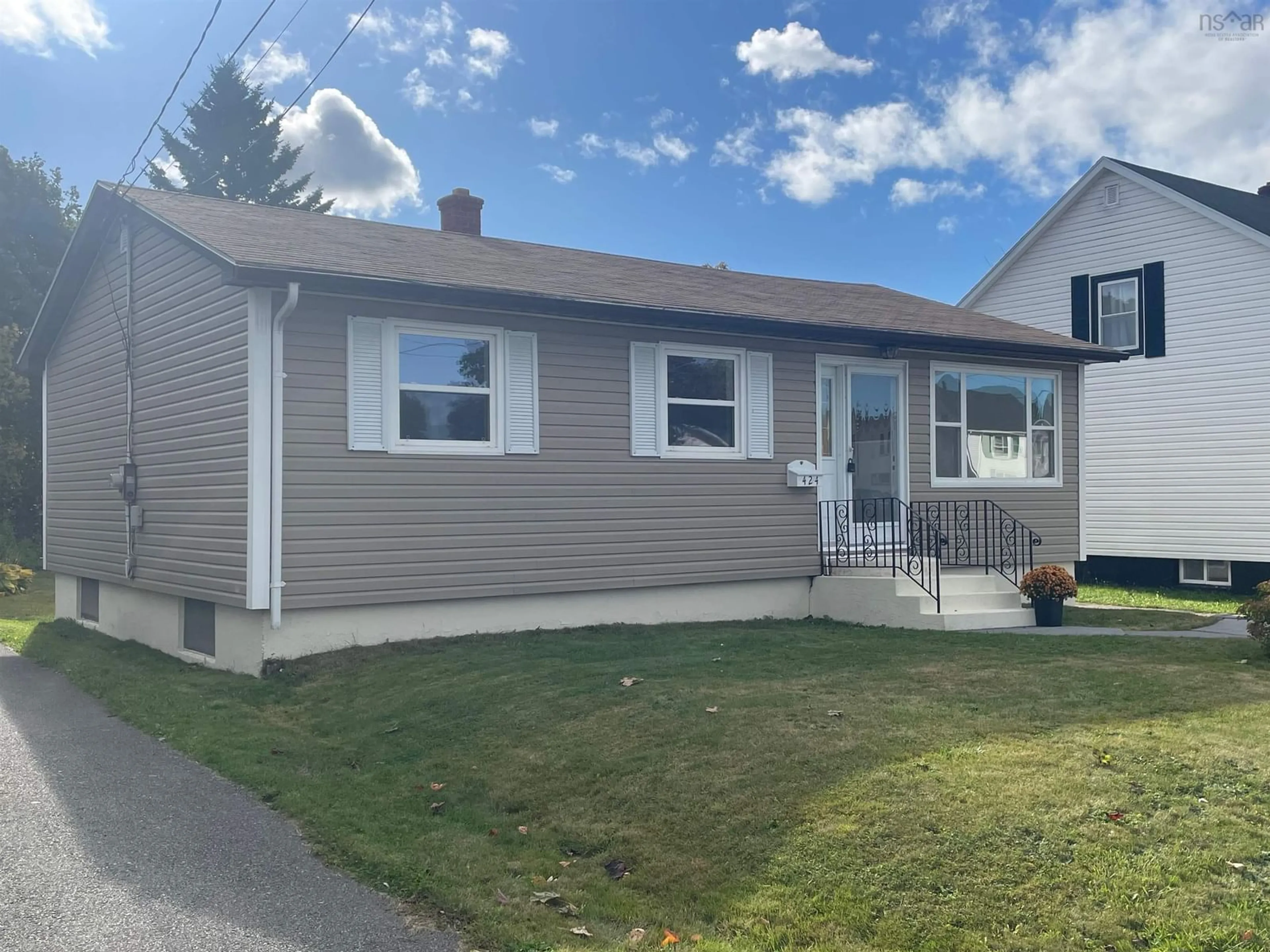 Home with vinyl exterior material, street for 424 Birch Hill Drive, Sydney Nova Scotia B1P 3V9