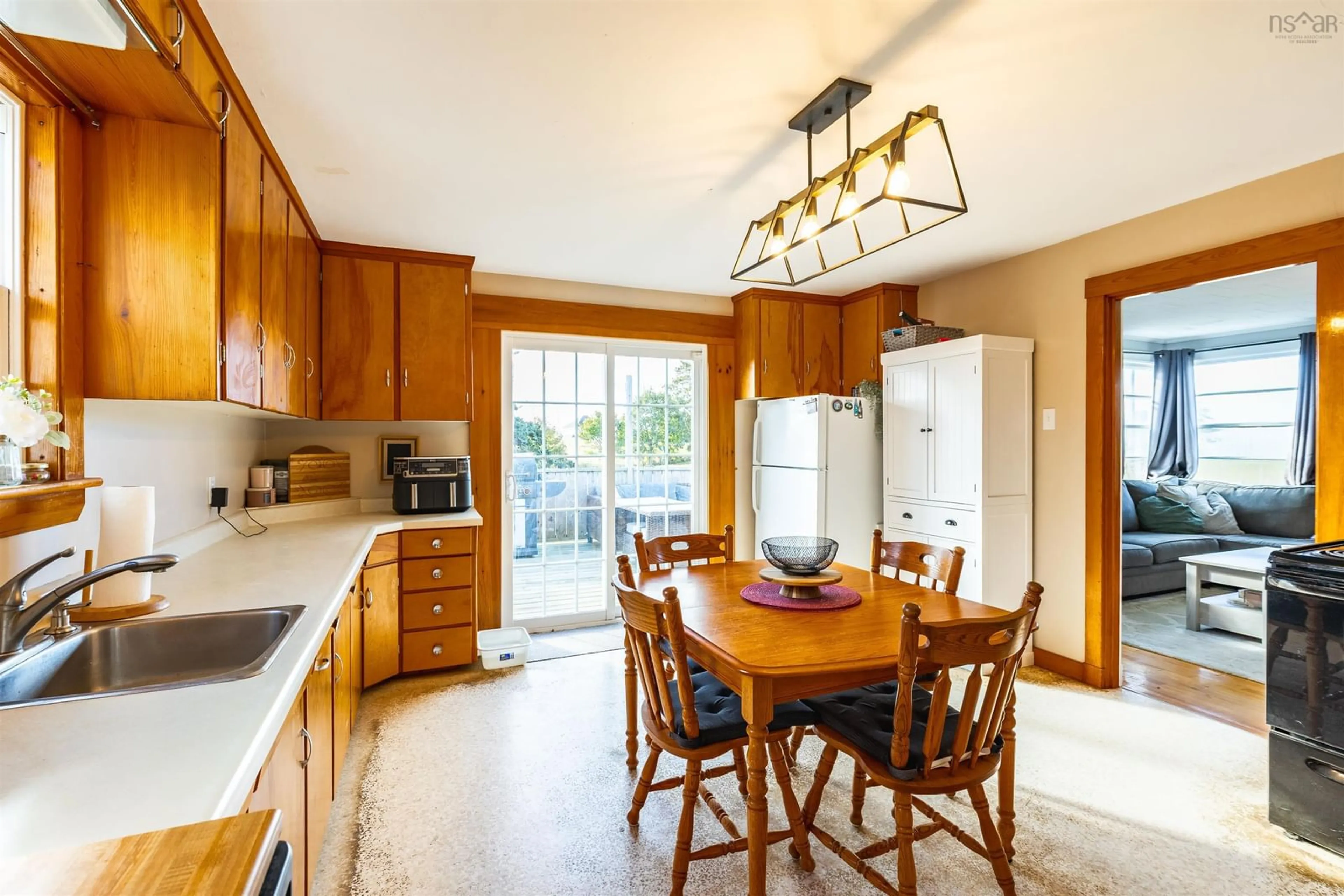 Open concept kitchen, ceramic/tile floor for 41 School St, Lower West Pubnico Nova Scotia B0W 2C0