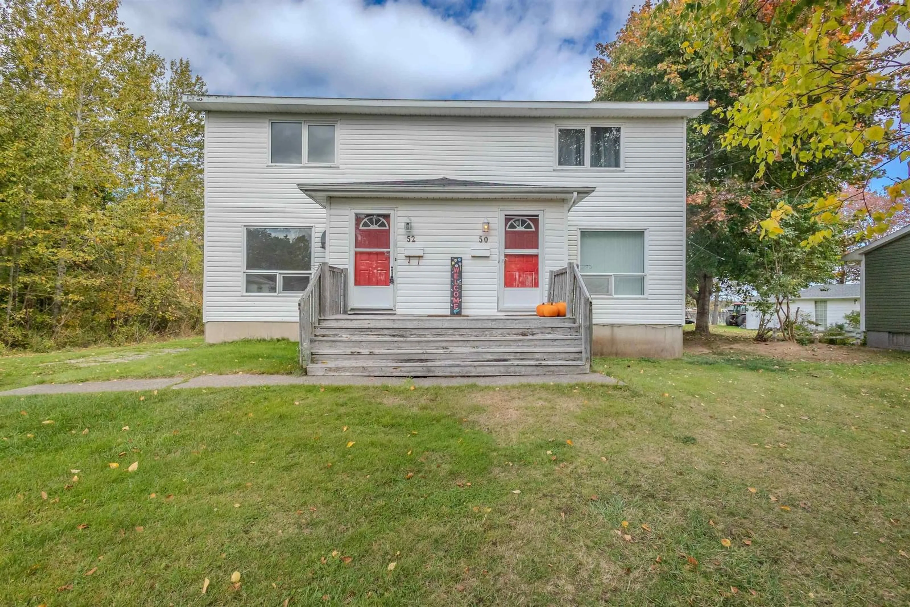 A pic from outside/outdoor area/front of a property/back of a property/a pic from drone, building for 50/52 Myrtle St, Westmount Nova Scotia B1L 1A7