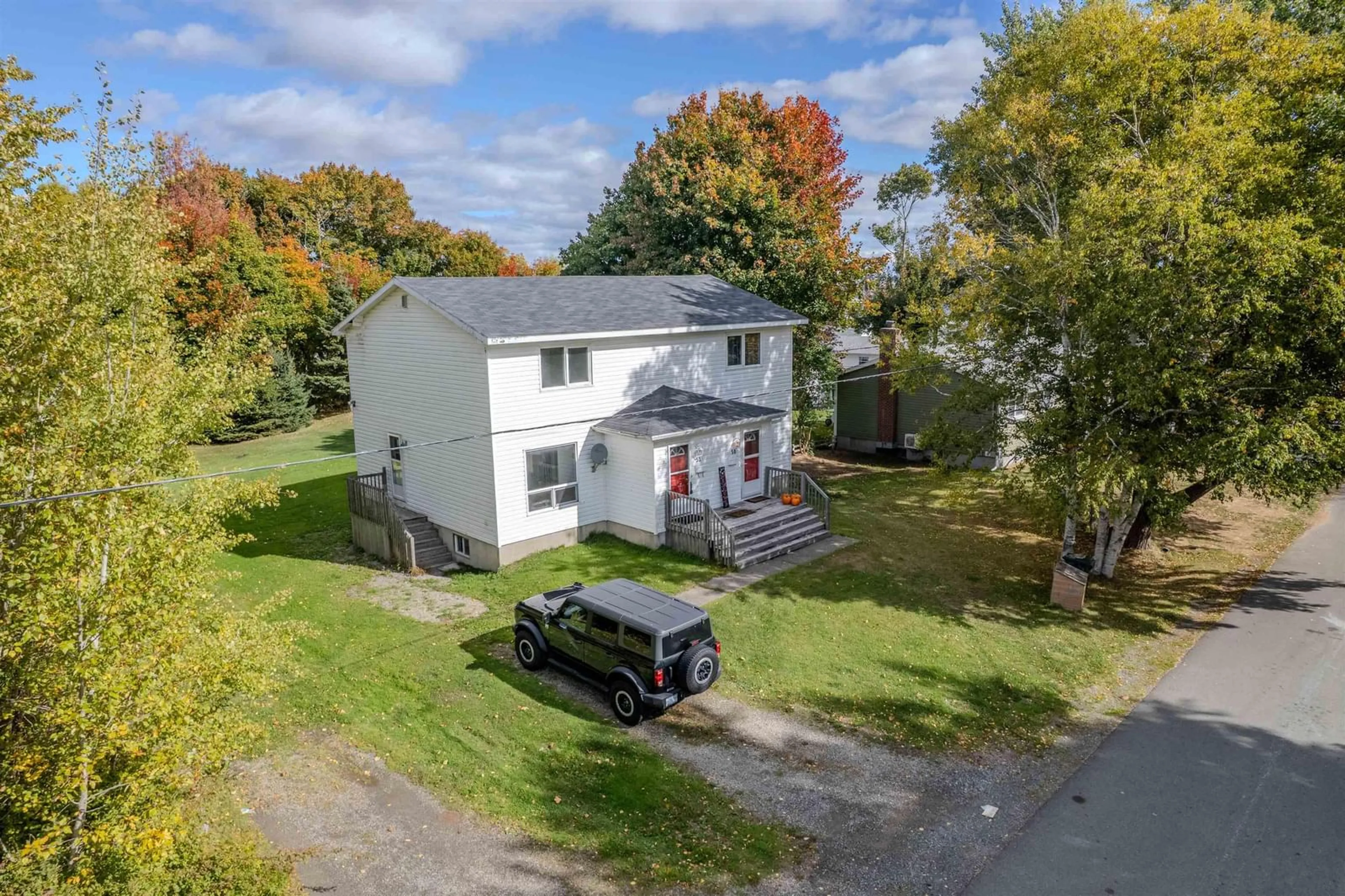 A pic from outside/outdoor area/front of a property/back of a property/a pic from drone, street for 50/52 Myrtle St, Westmount Nova Scotia B1L 1A7