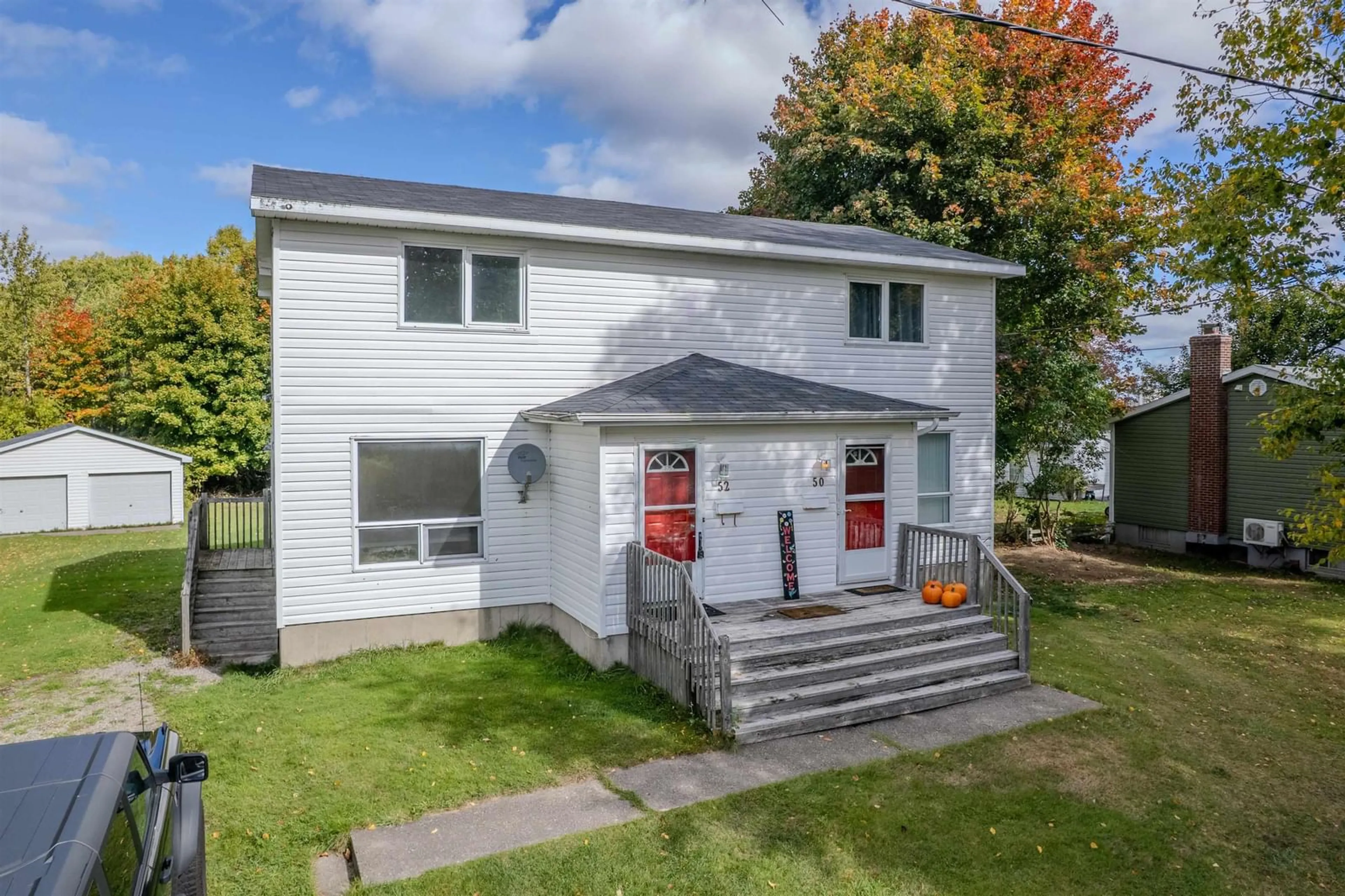 Home with vinyl exterior material, street for 50/52 Myrtle St, Westmount Nova Scotia B1L 1A7