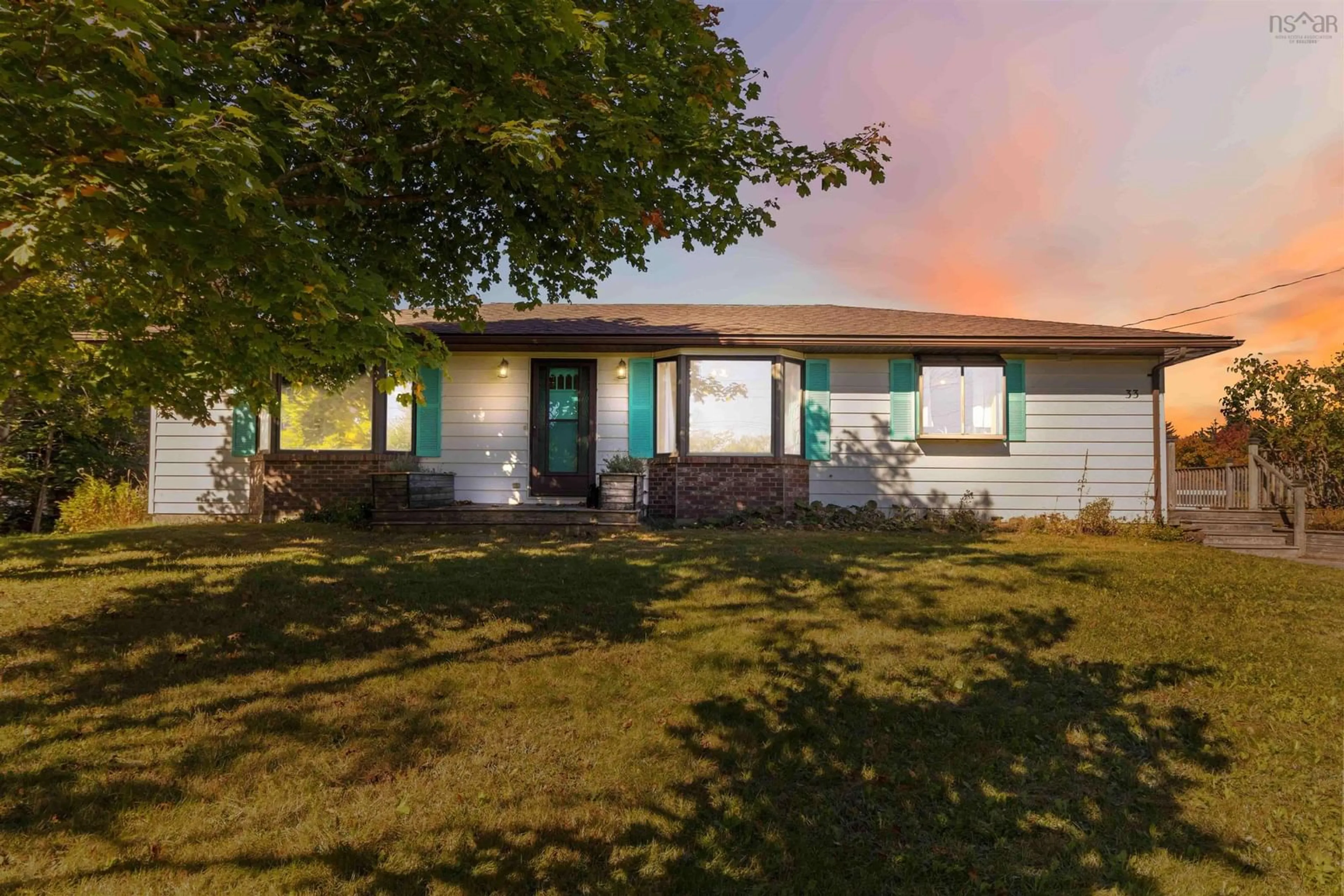 Home with vinyl exterior material, street for 33 Mcintyre Road, East Lawrencetown Nova Scotia B2Z 1P1