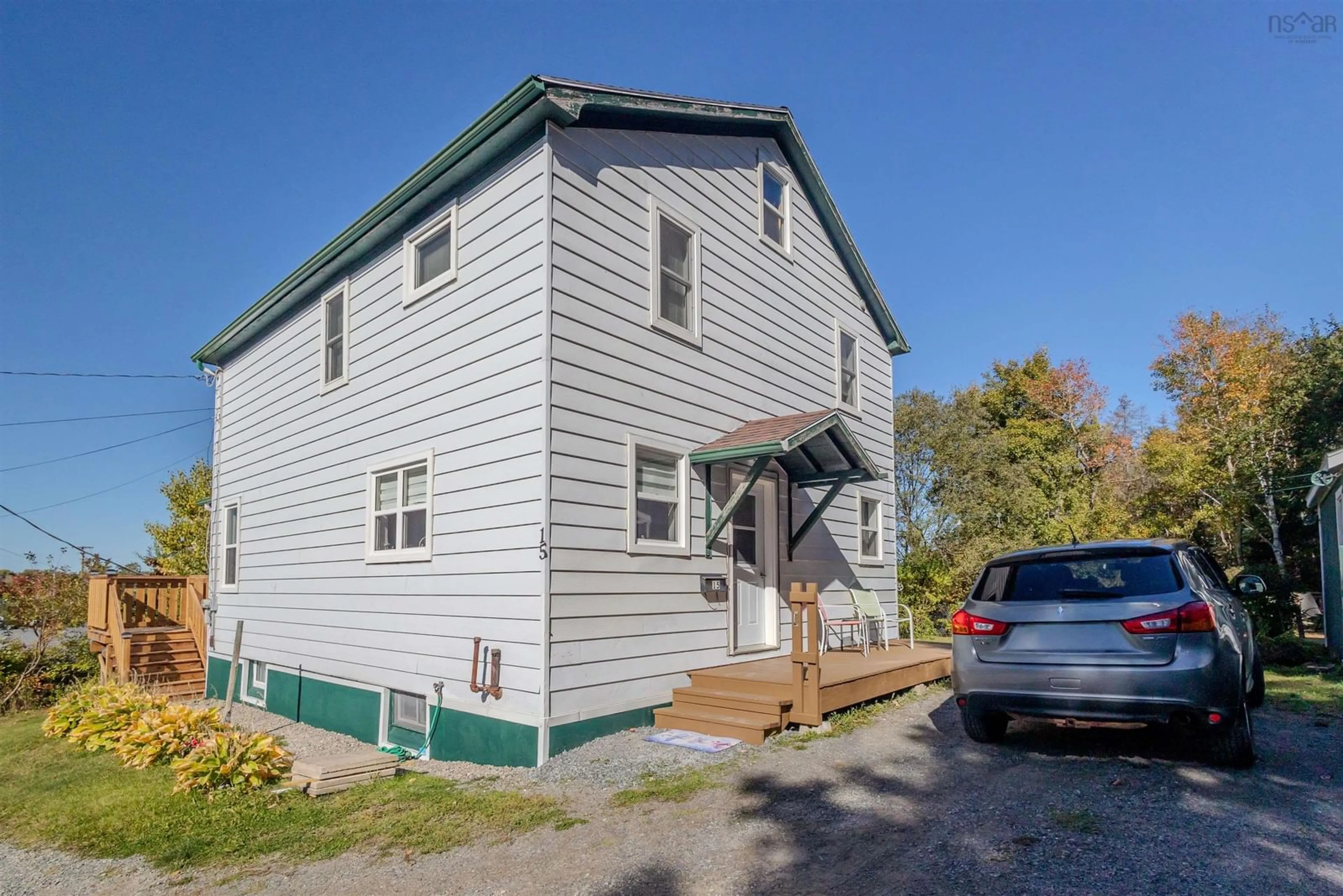 A pic from outside/outdoor area/front of a property/back of a property/a pic from drone, unknown for 15 Harriet St, Sydney River Nova Scotia B1S 1S5