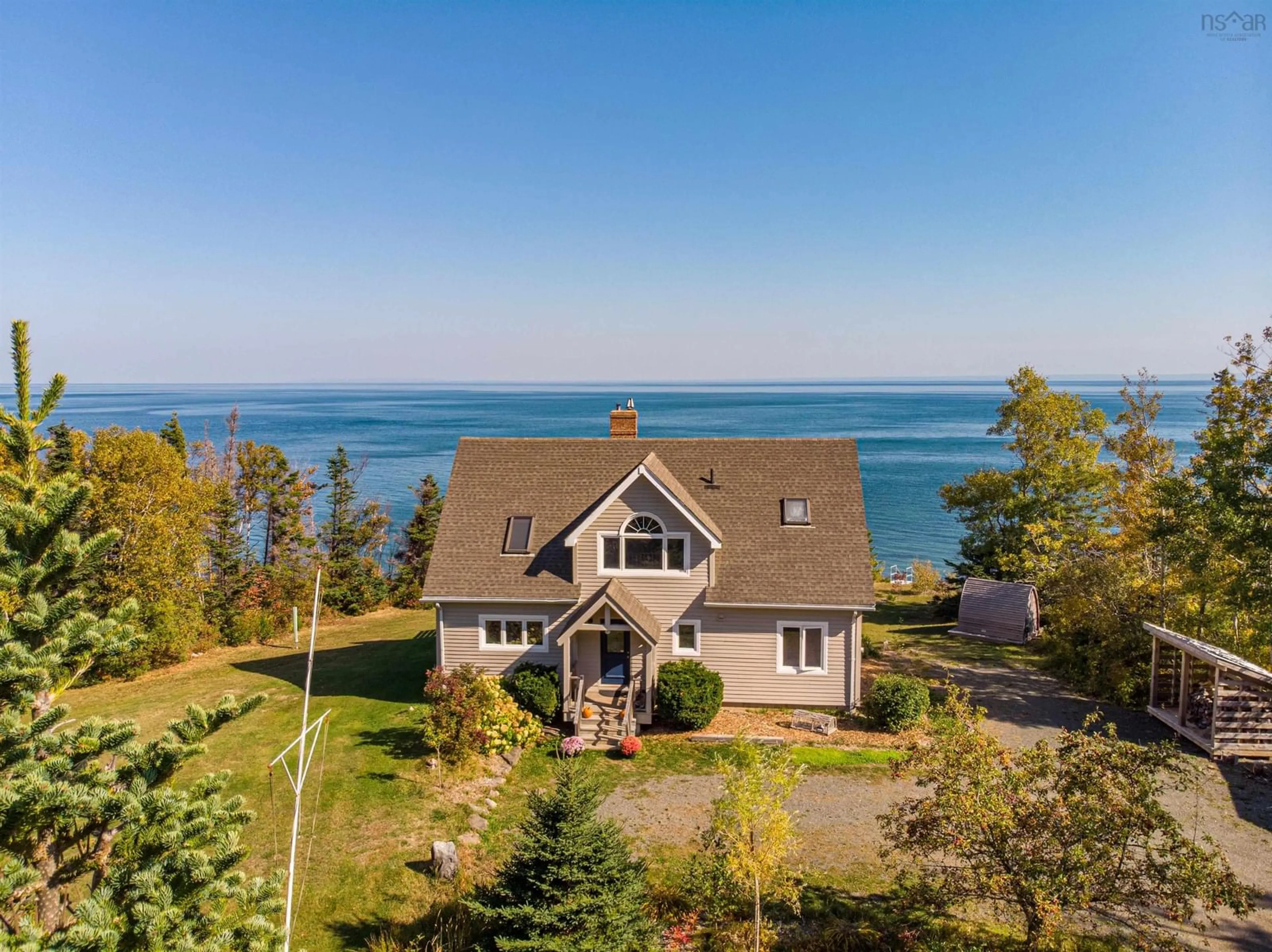 A pic from outside/outdoor area/front of a property/back of a property/a pic from drone, water/lake/river/ocean view for 5478 Highway 337, Cape George, Ant. Co. N.S., Cape George Nova Scotia B2G 2L2