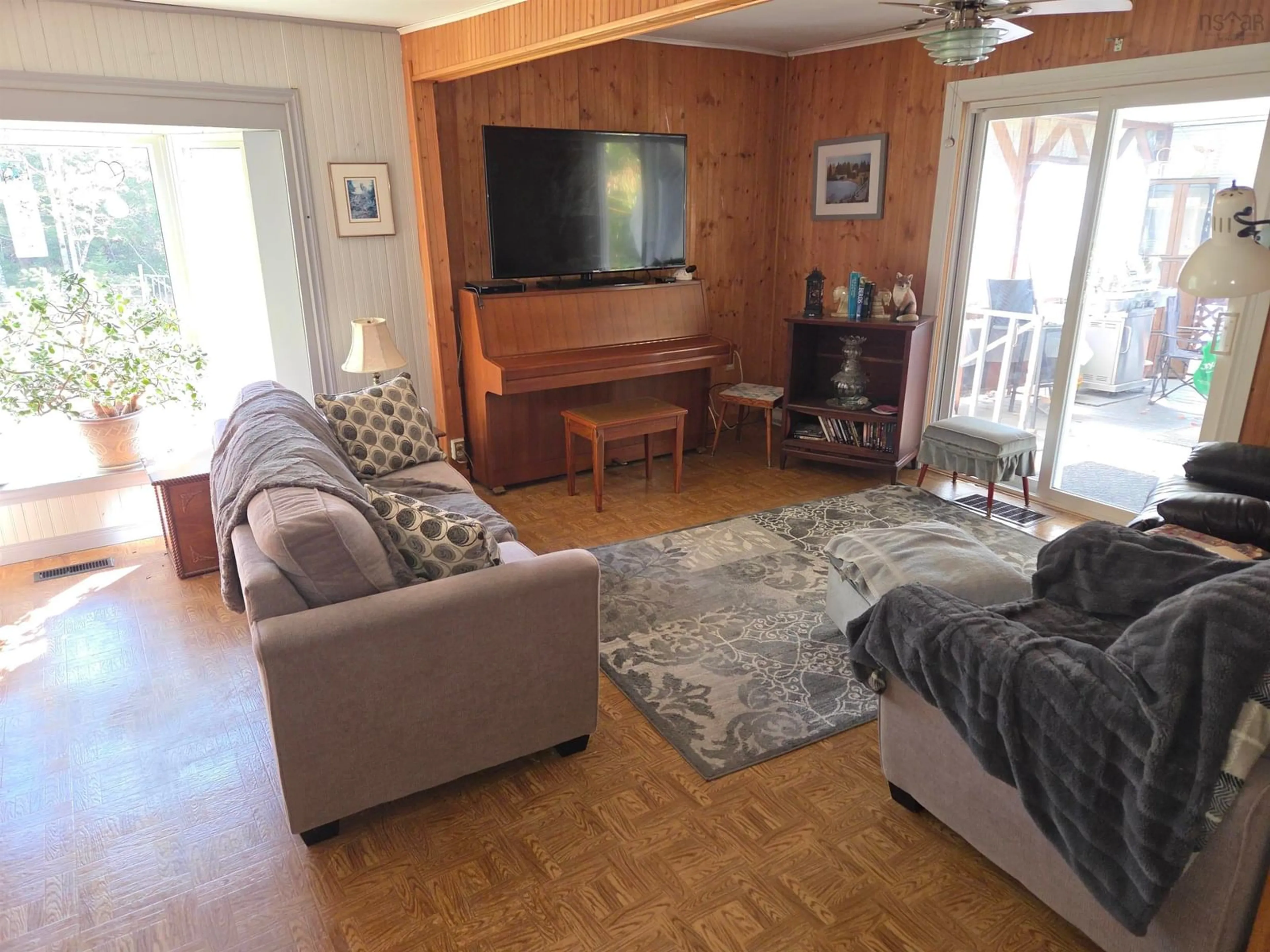 Living room with furniture, wood/laminate floor for 624 Salem Cross Rd, Macphees Corner Nova Scotia B0N 2H0