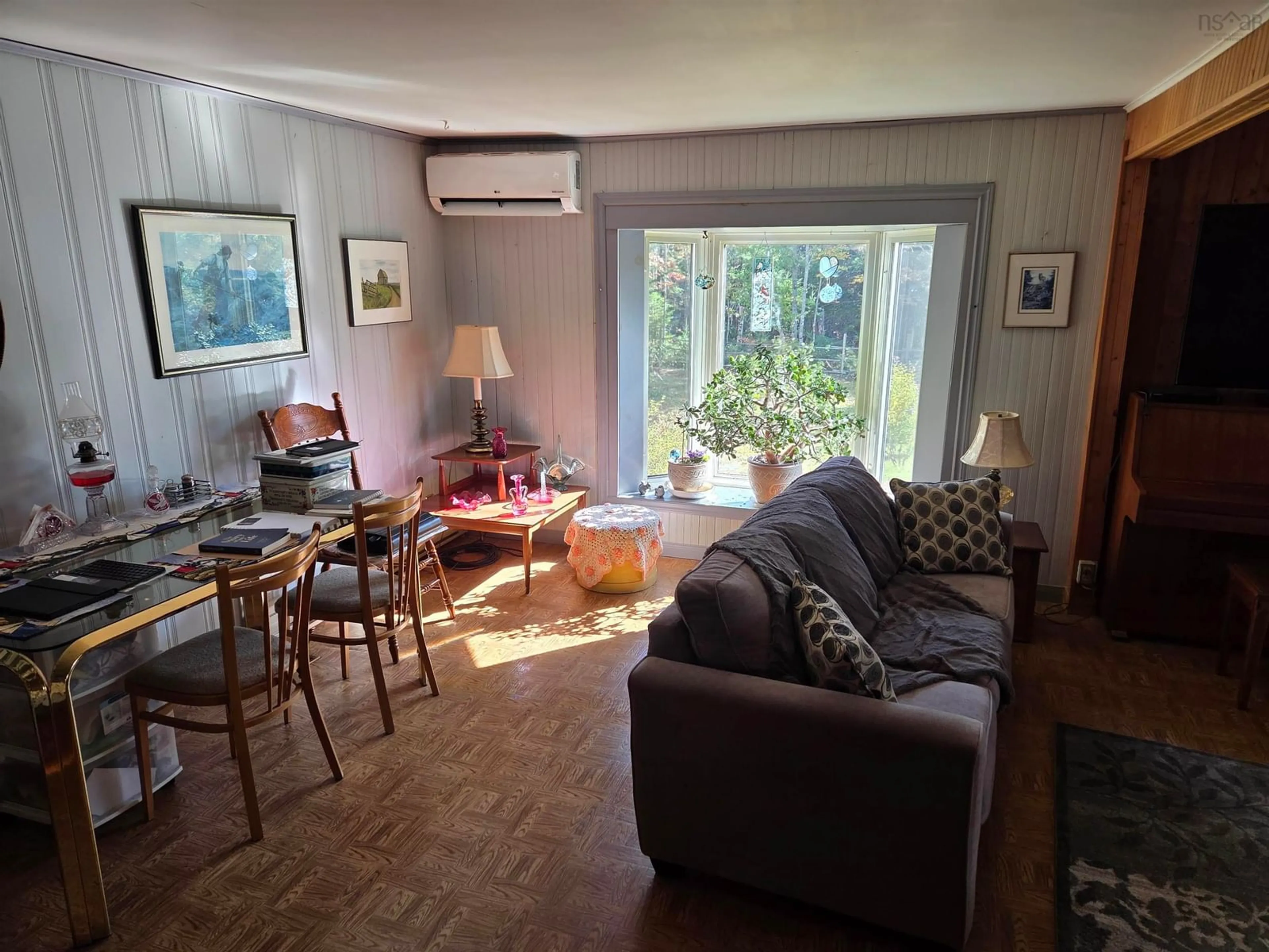 Living room with furniture, wood/laminate floor for 624 Salem Cross Rd, Macphees Corner Nova Scotia B0N 2H0