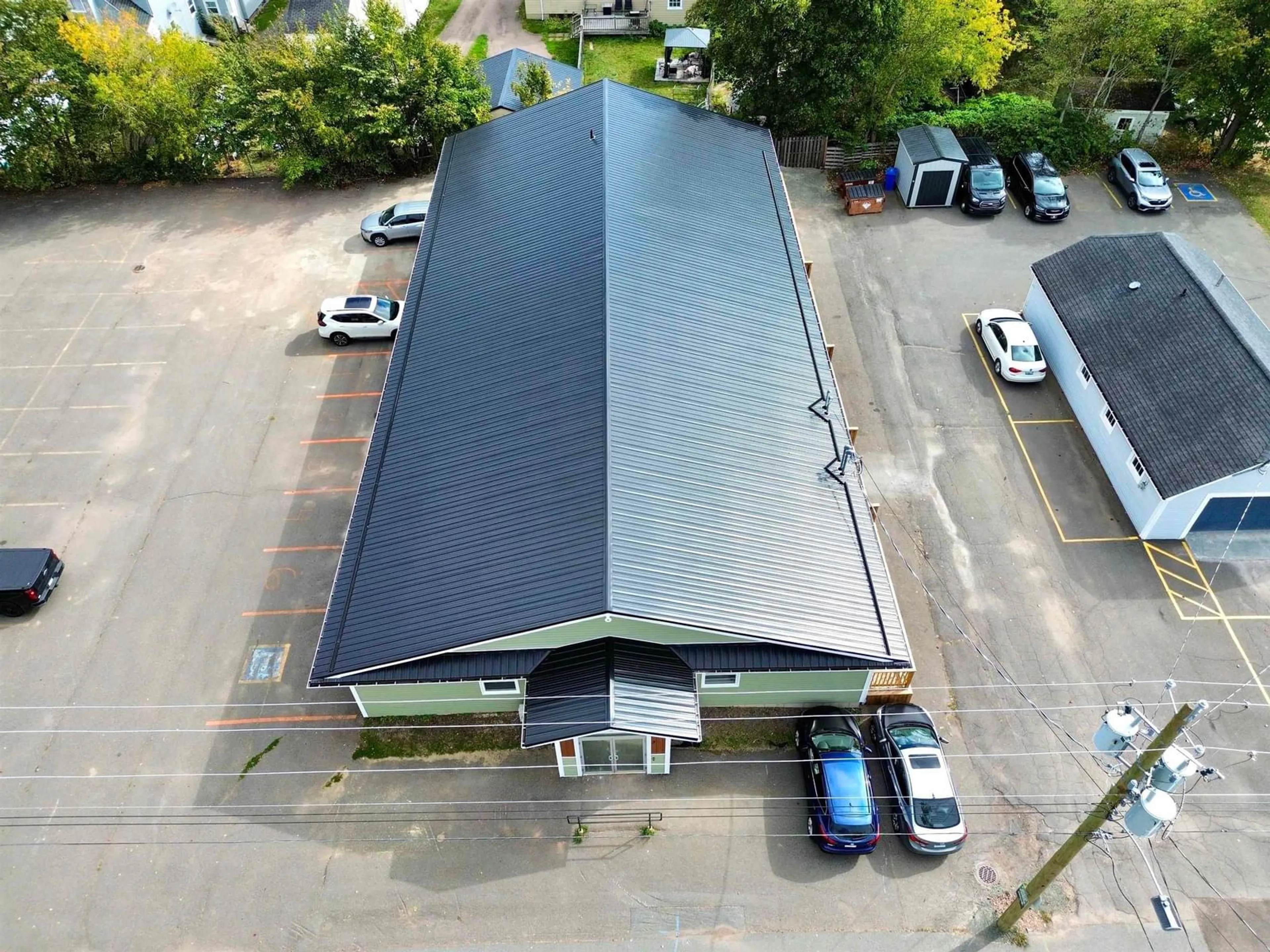 A pic from outside/outdoor area/front of a property/back of a property/a pic from drone, building for 3 Robie St, Amherst Nova Scotia B4H 2C5
