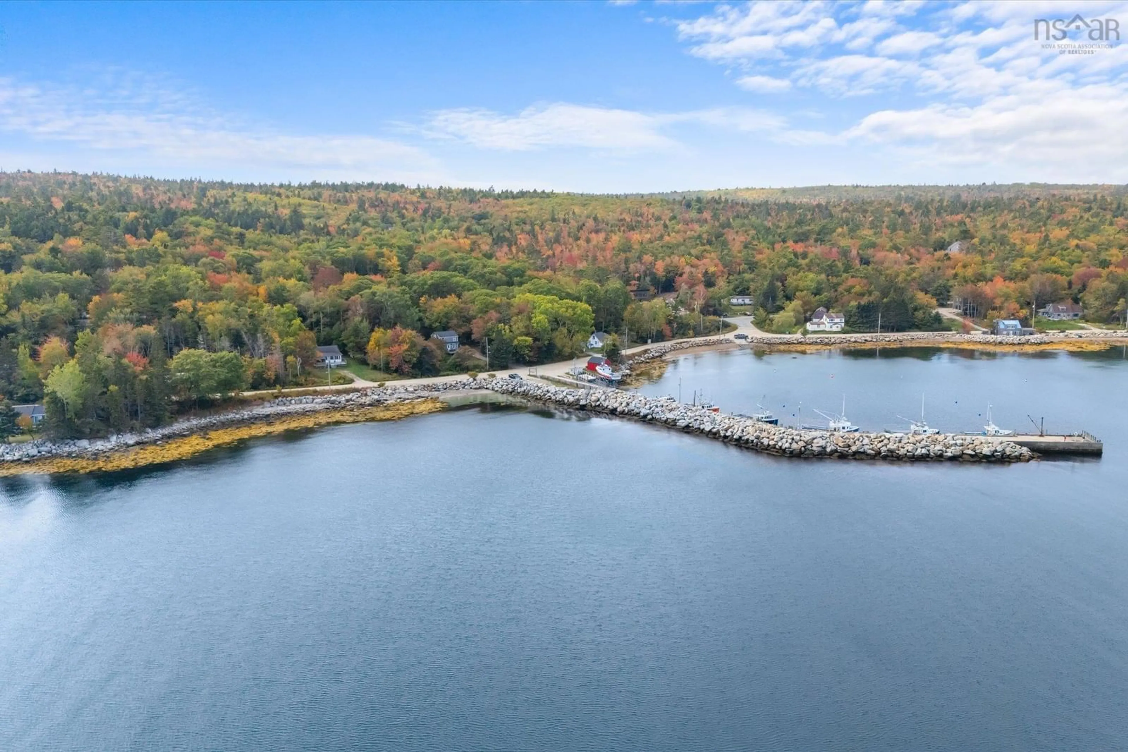 A pic from outside/outdoor area/front of a property/back of a property/a pic from drone, water/lake/river/ocean view for 348 Mill Cove Shore Rd, Mill Cove Nova Scotia B0J 1T0