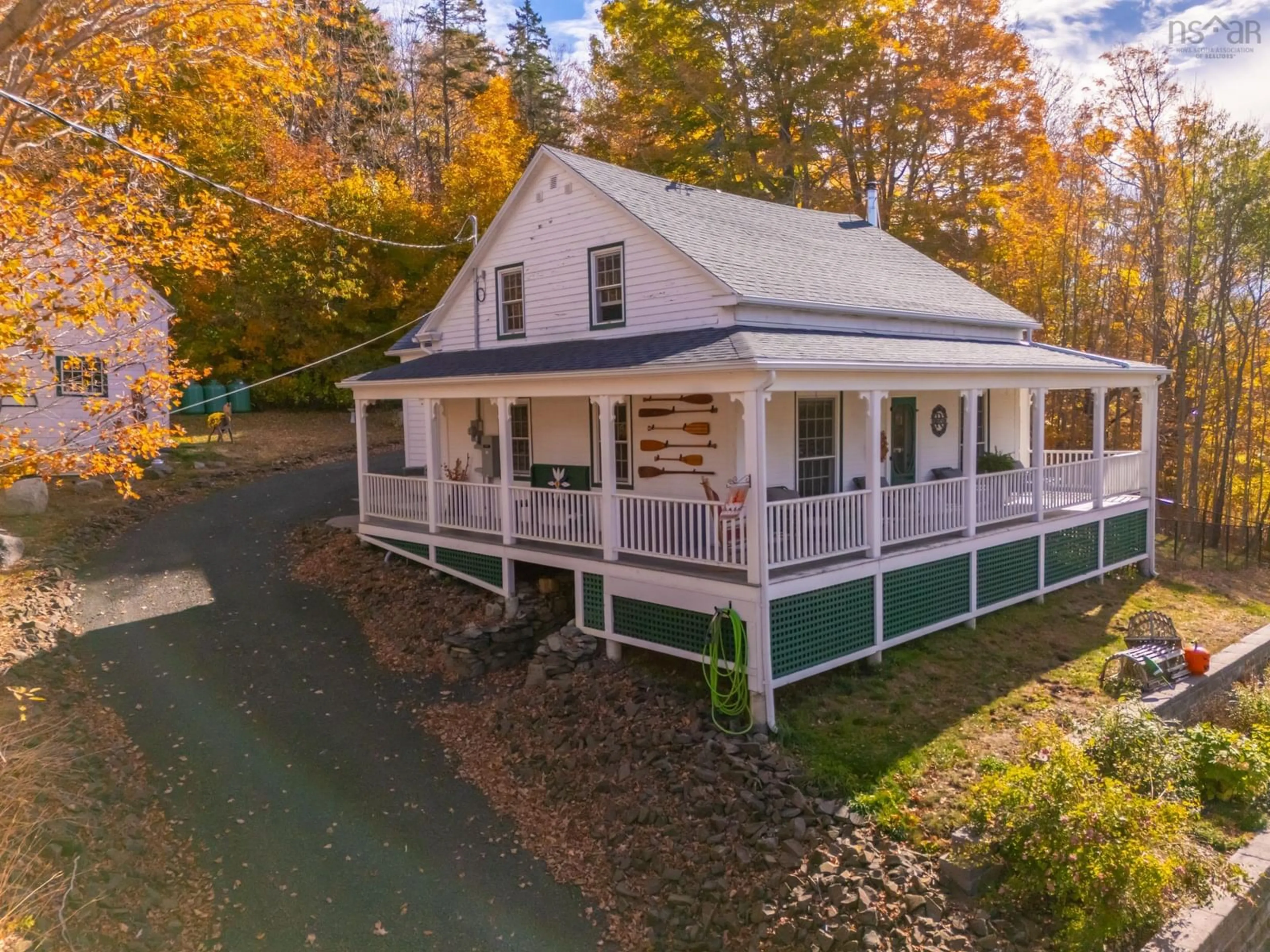 A pic from outside/outdoor area/front of a property/back of a property/a pic from drone, street for 40 Chute Road, Bear River Nova Scotia B0S 1B0