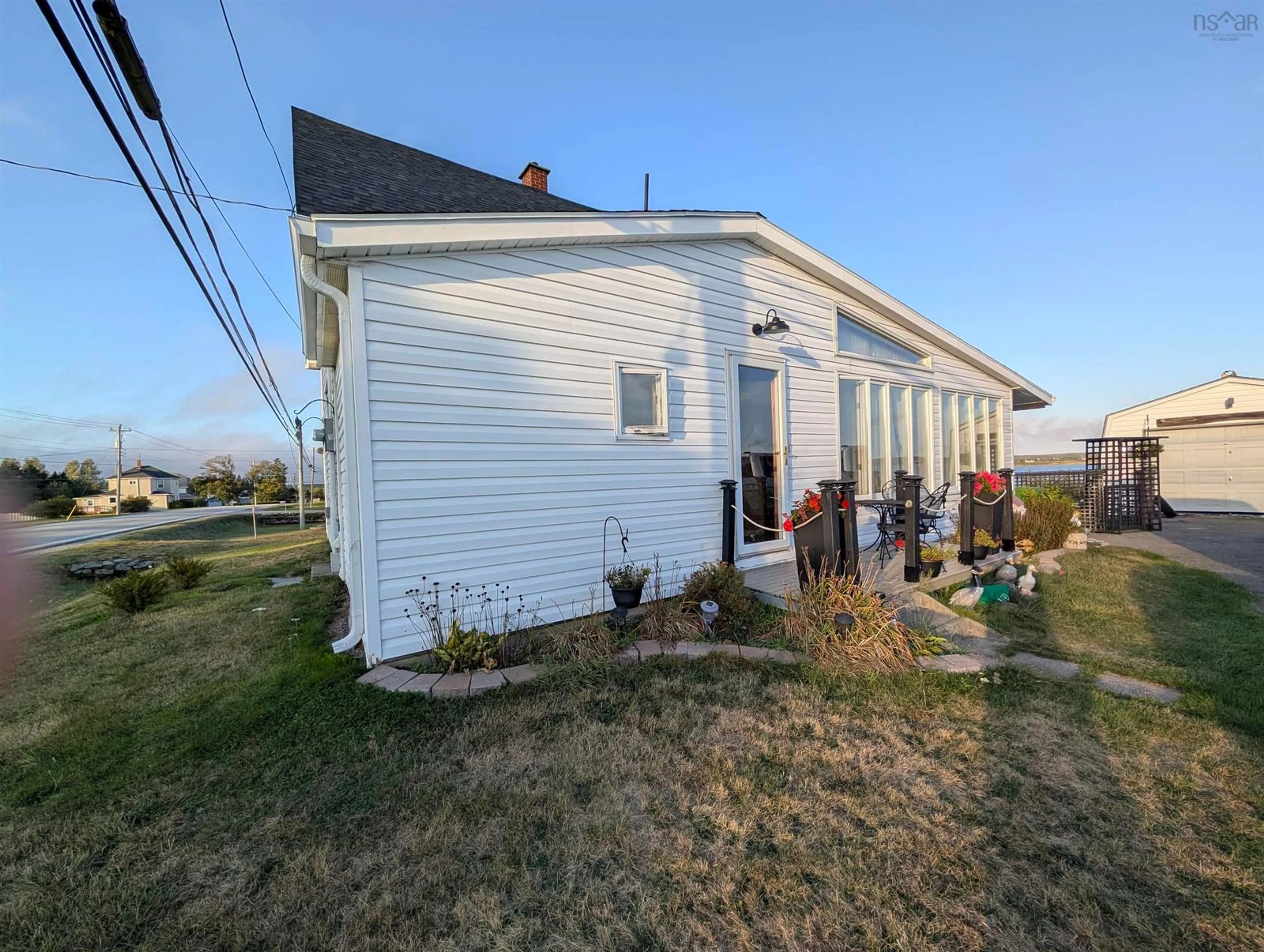 A pic from outside/outdoor area/front of a property/back of a property/a pic from drone, building for 637 Highway 335, West Pubnico Nova Scotia B0W 3S0