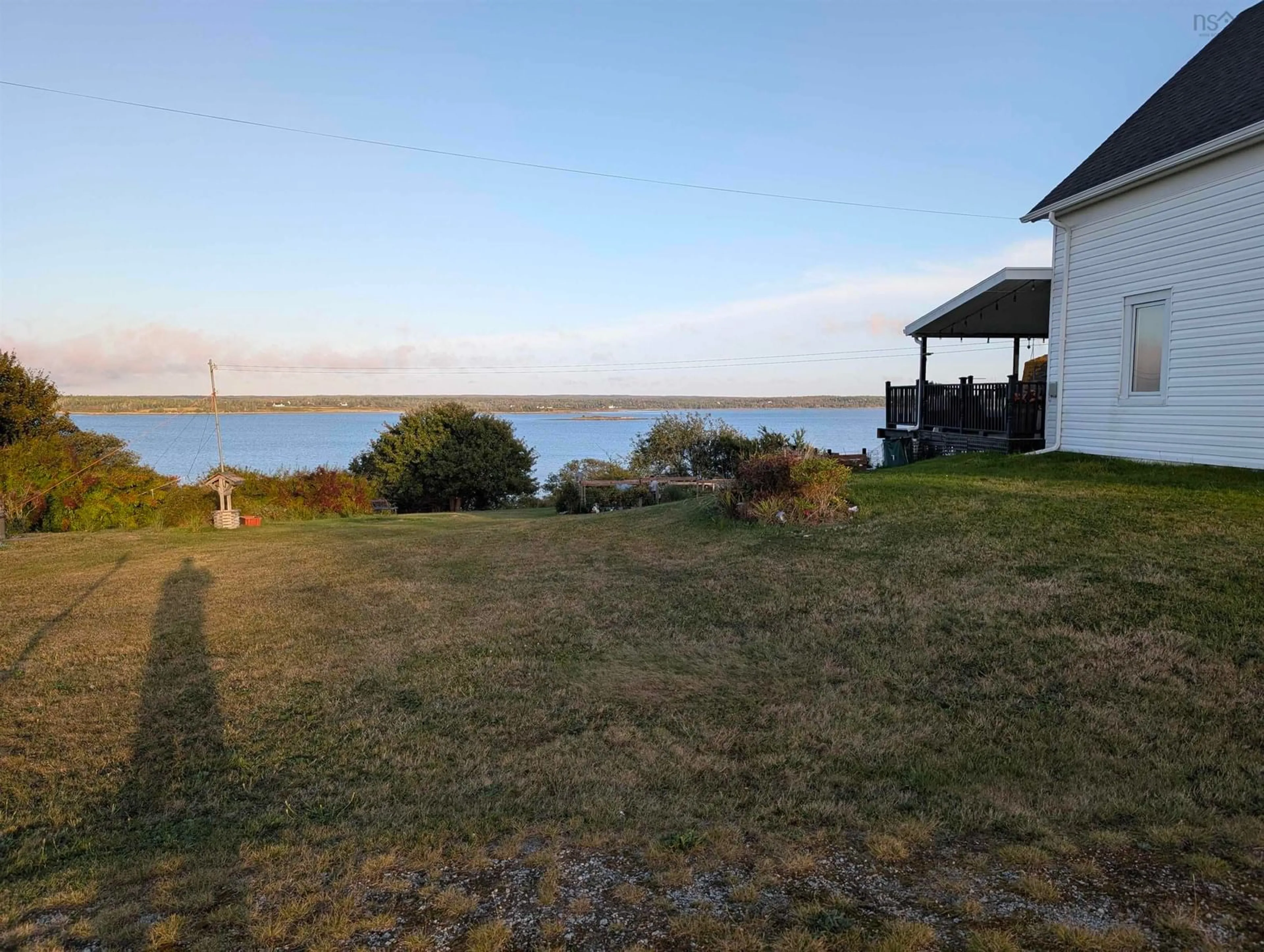 A pic from outside/outdoor area/front of a property/back of a property/a pic from drone, water/lake/river/ocean view for 637 Highway 335, West Pubnico Nova Scotia B0W 3S0
