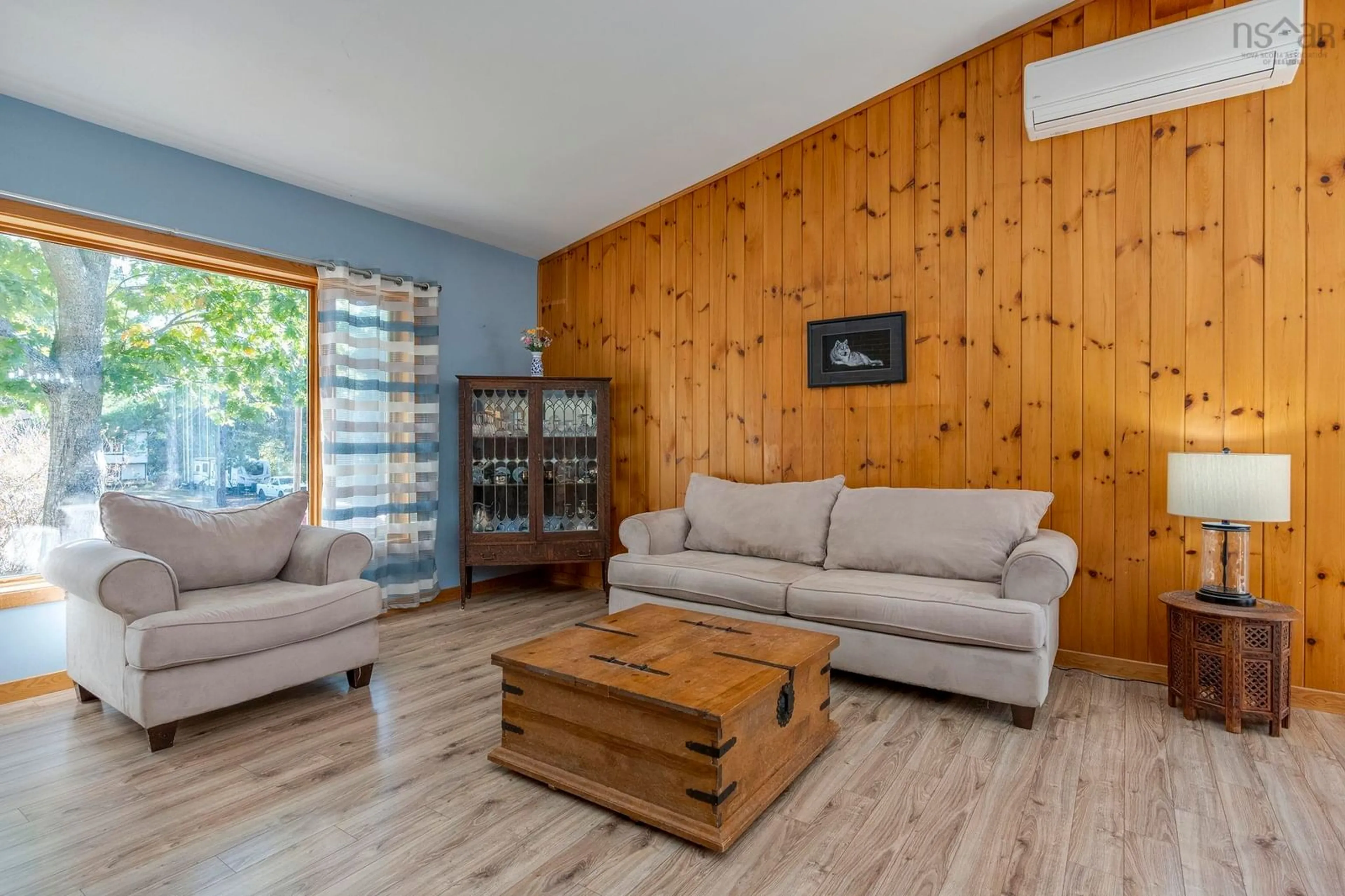 Living room with furniture, wood/laminate floor for 1707 Matthews Lane, Kingston Nova Scotia B0P 1R0