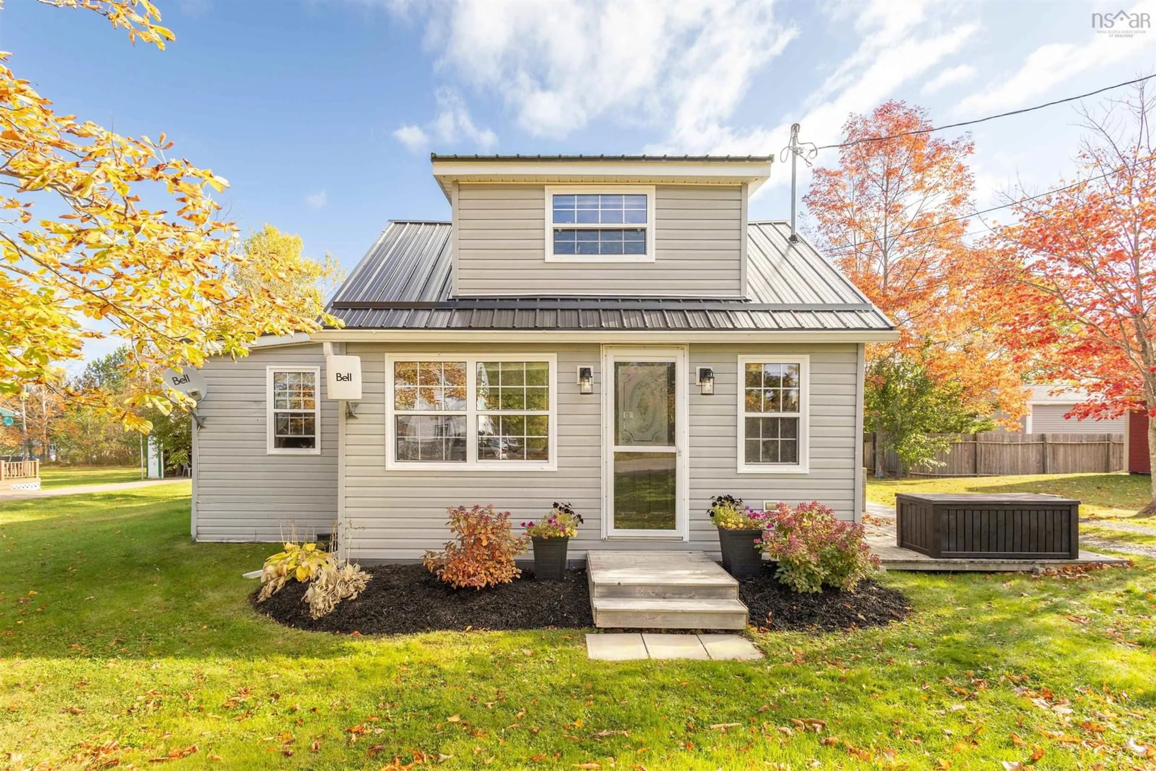 Home with vinyl exterior material, street for 160 Twining St, Baddeck Nova Scotia B0E 1B0