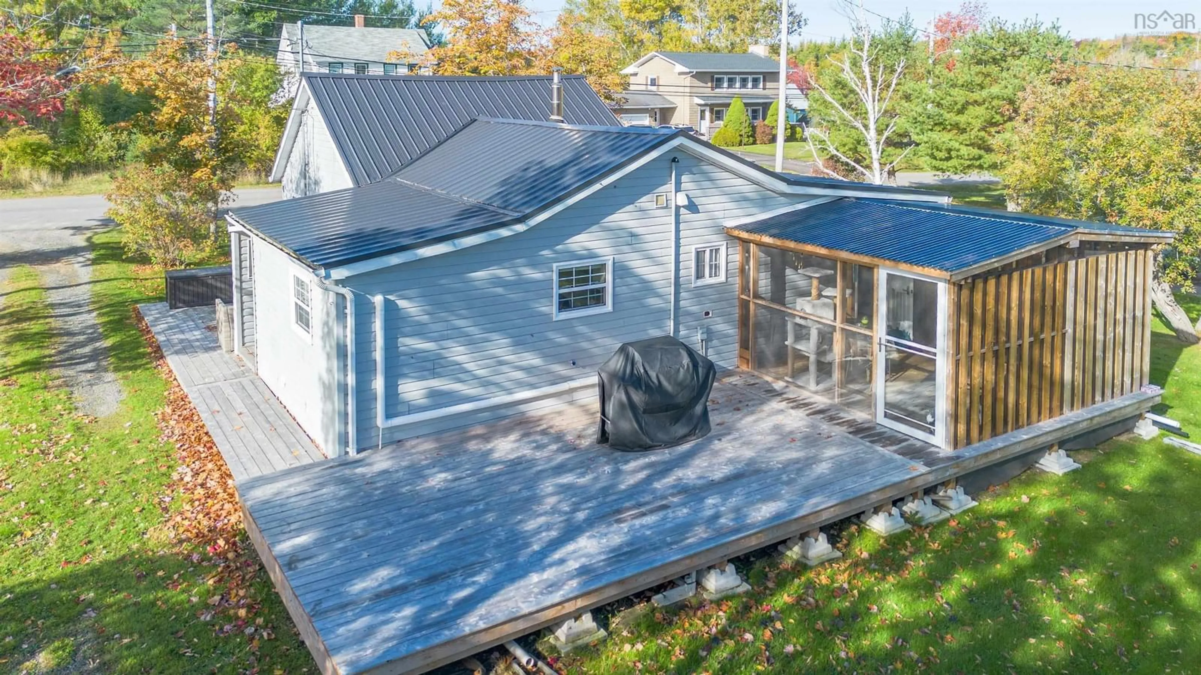 A pic from outside/outdoor area/front of a property/back of a property/a pic from drone, water/lake/river/ocean view for 160 Twining St, Baddeck Nova Scotia B0E 1B0