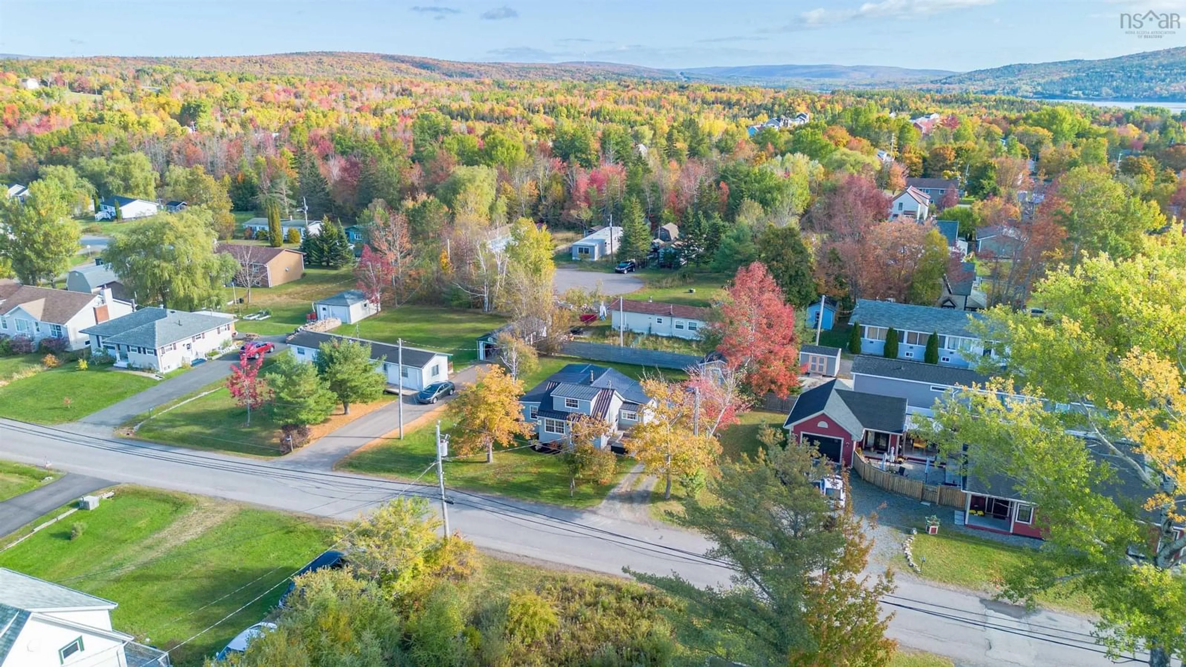 A pic from outside/outdoor area/front of a property/back of a property/a pic from drone, unknown for 160 Twining St, Baddeck Nova Scotia B0E 1B0