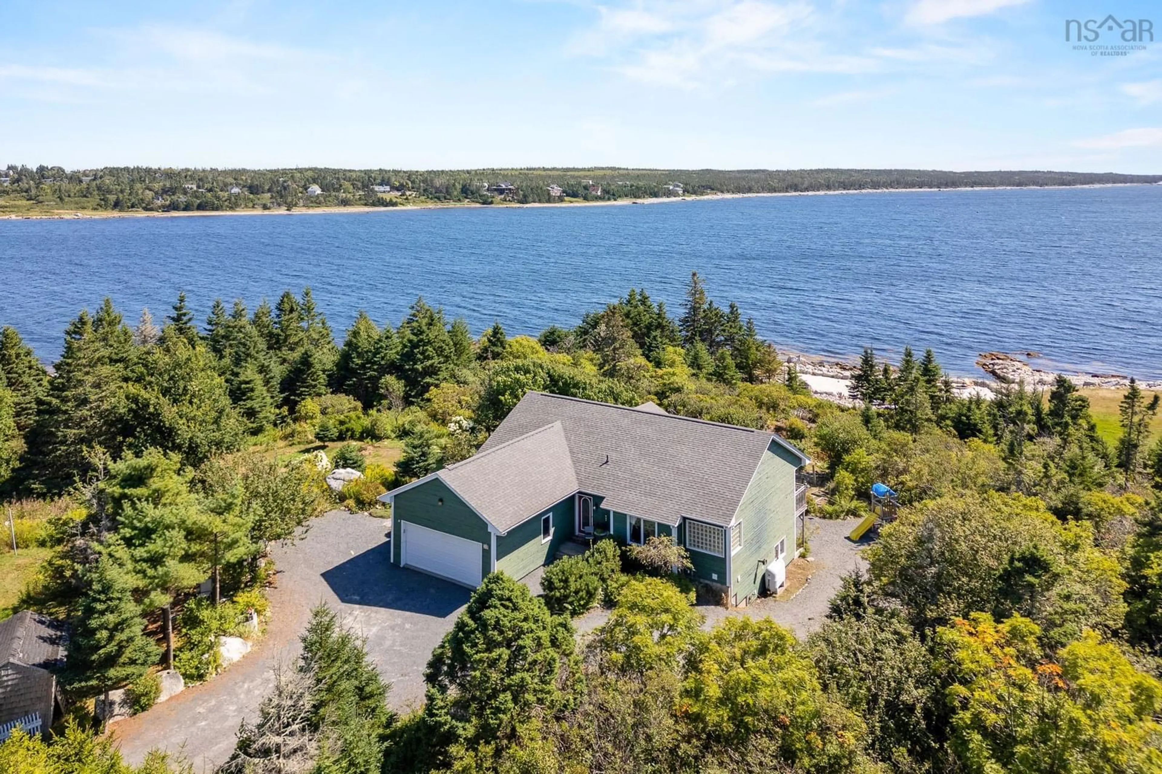 A pic from outside/outdoor area/front of a property/back of a property/a pic from drone, water/lake/river/ocean view for 50 Fawsons Cove Rd, West Pennant Nova Scotia B3V 1M2