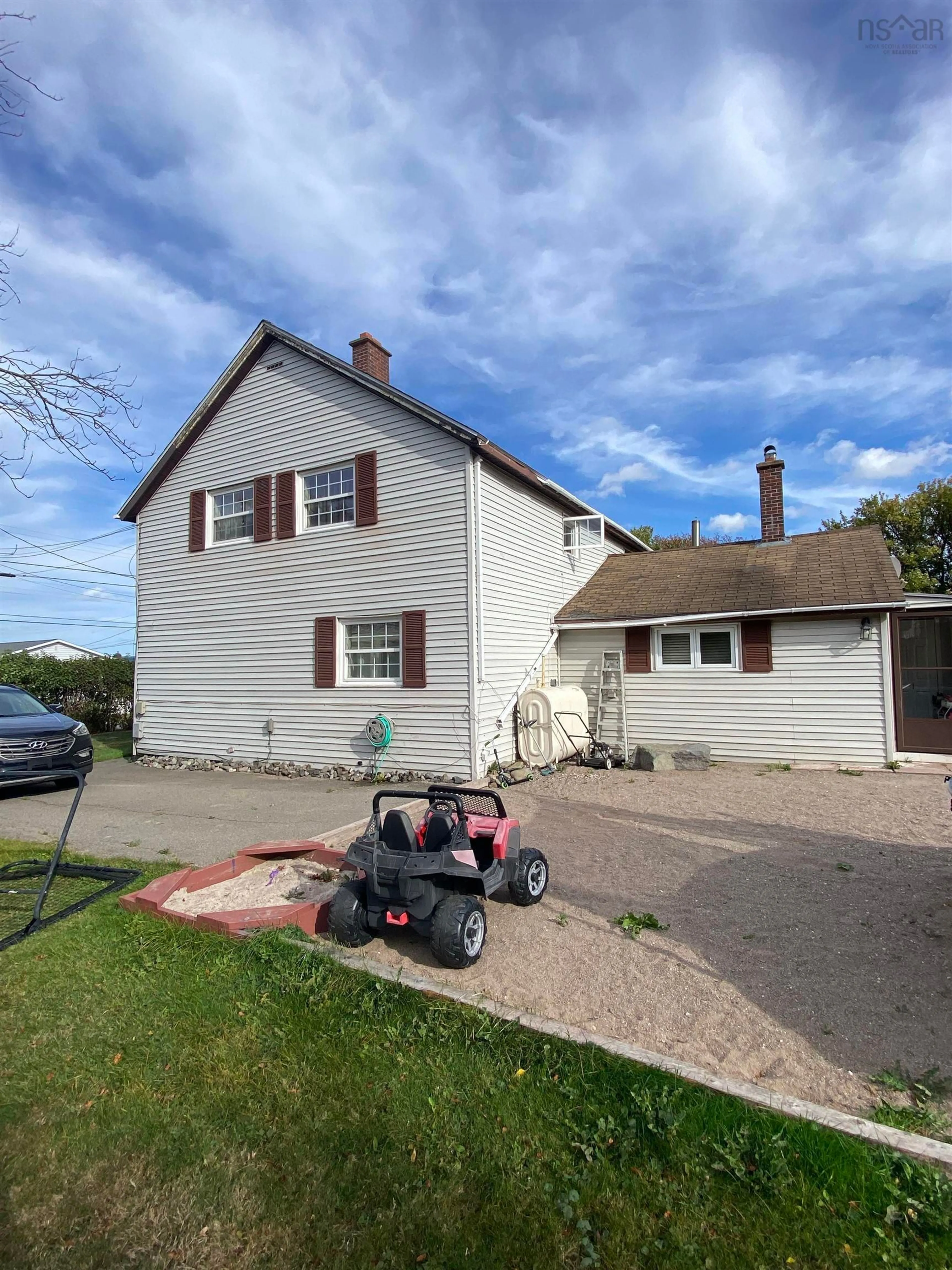 A pic from outside/outdoor area/front of a property/back of a property/a pic from drone, street for 3452 Wilson Ave, New Waterford Nova Scotia B1H 1W9