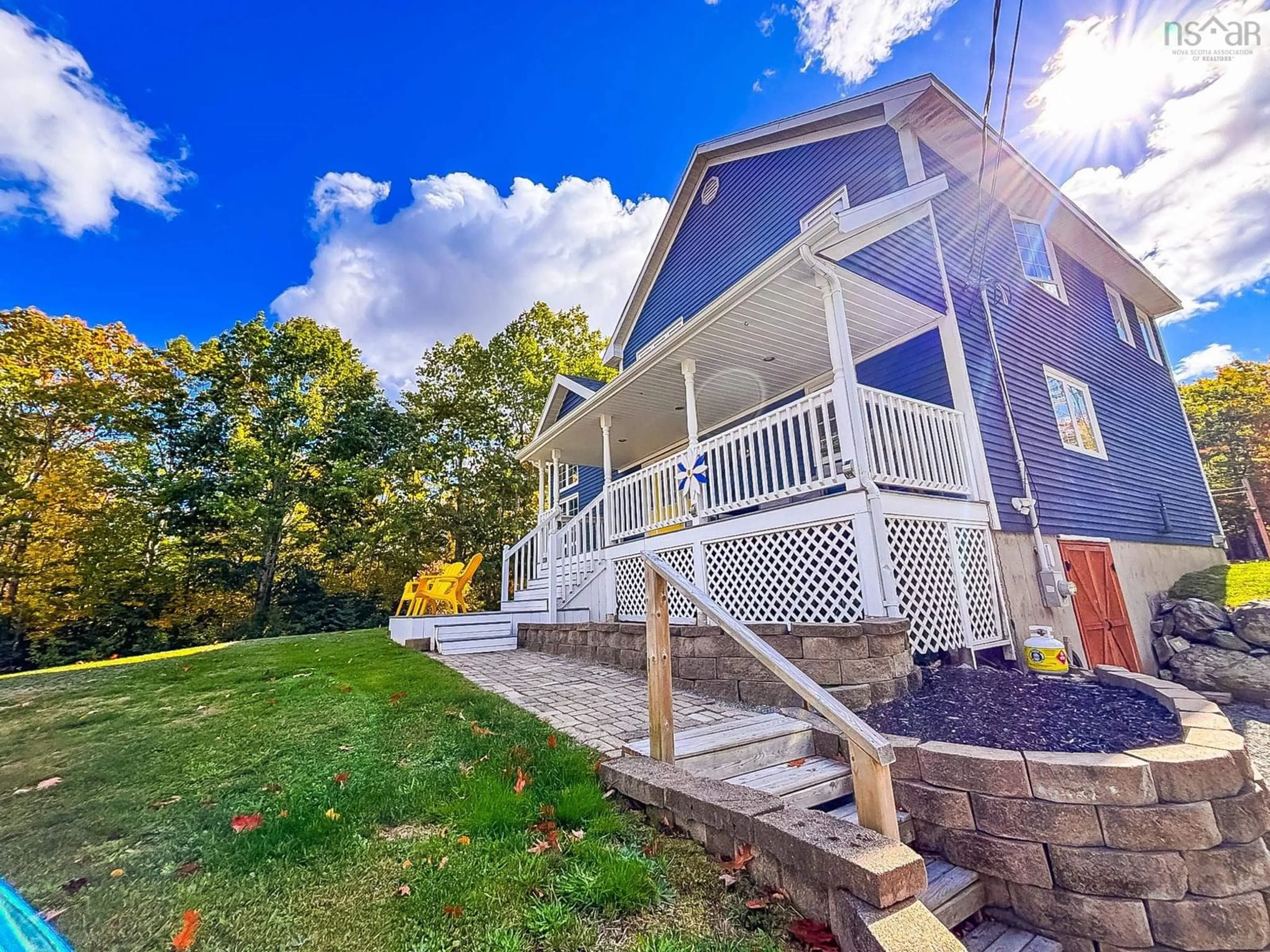 A pic from outside/outdoor area/front of a property/back of a property/a pic from drone, water/lake/river/ocean view for 130 Highway 331, Mill Village Nova Scotia B0J 2H0