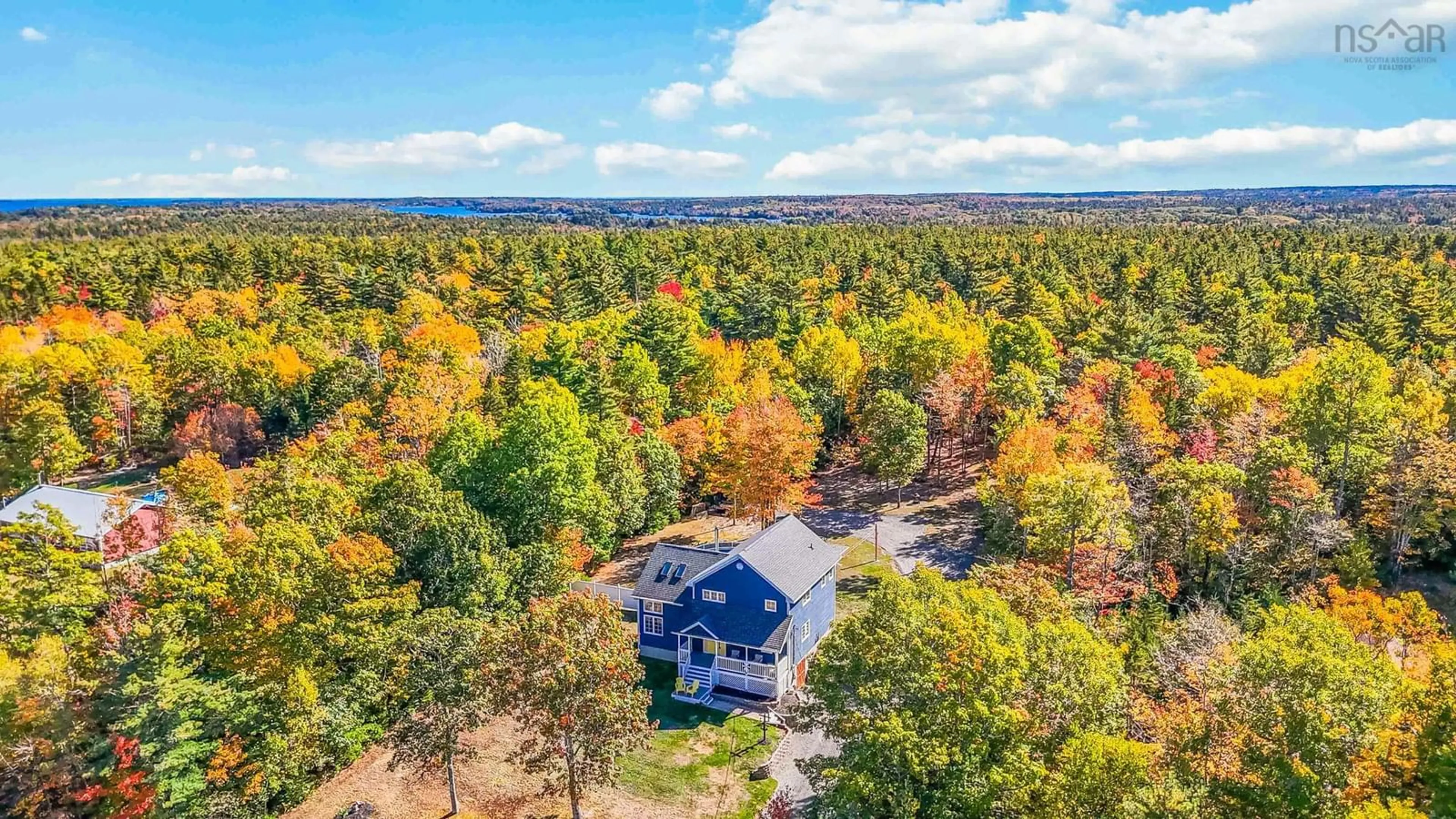 A pic from outside/outdoor area/front of a property/back of a property/a pic from drone, forest/trees view for 130 Highway 331, Mill Village Nova Scotia B0J 2H0